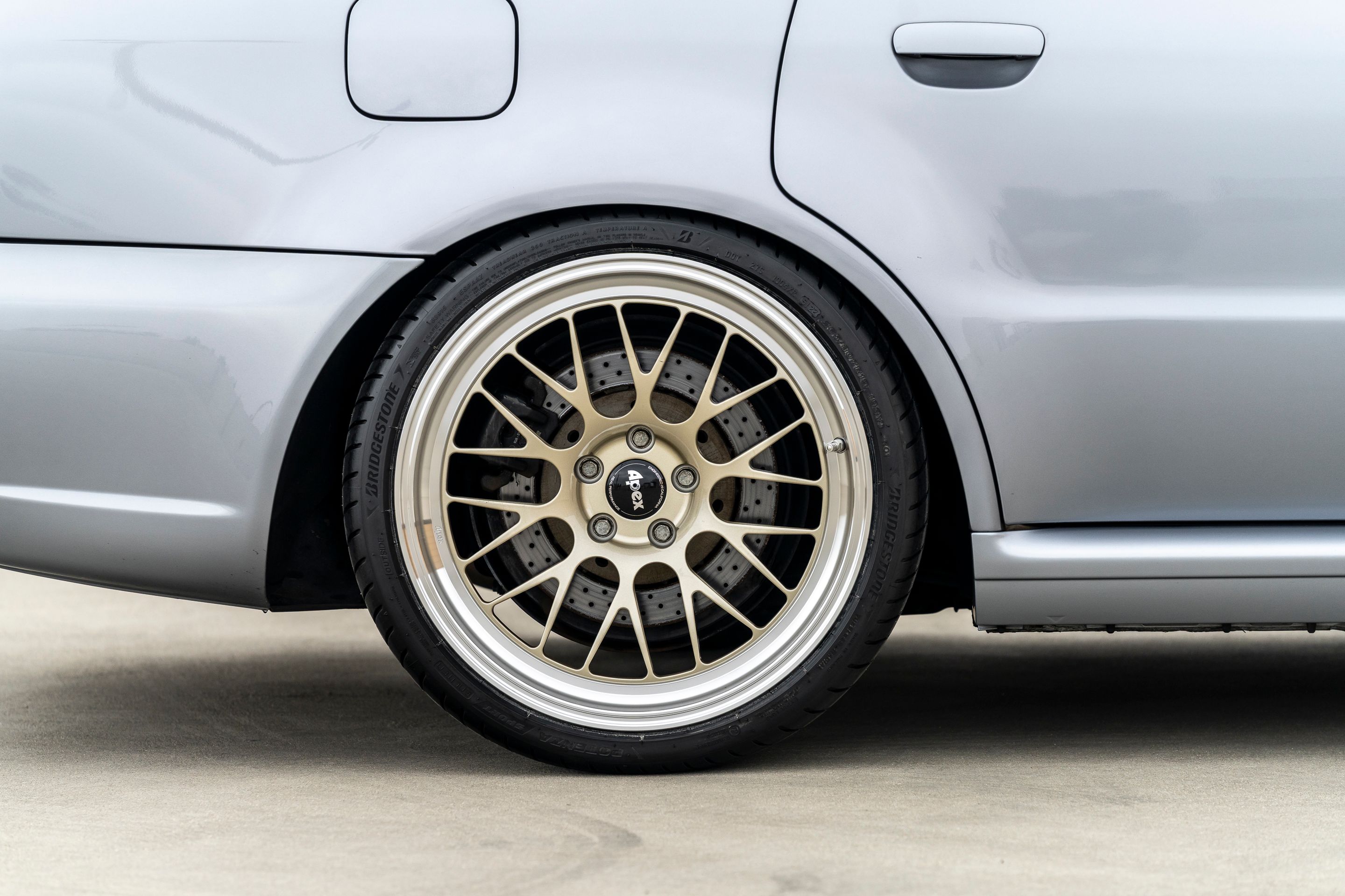 Silver Audi B5 RS 4 Avant/Wagon with 19" ML-10RT Apex wheels in Machined Lip Gloss Motorsport Gold