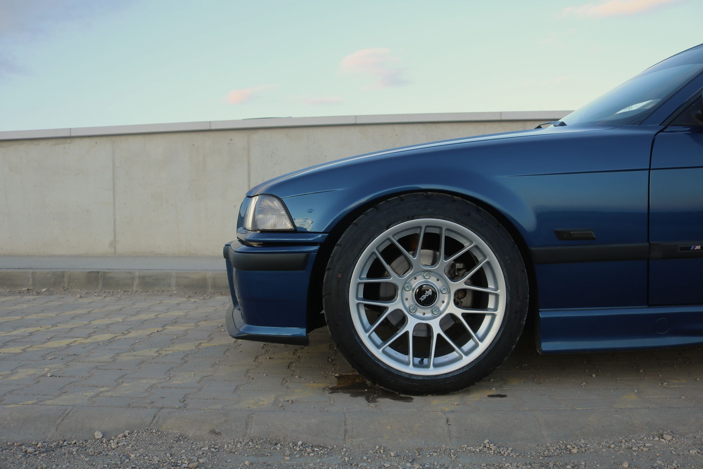 Blue BMW E36 3 Series with 17" ARC-8 Apex wheels in Race Silver