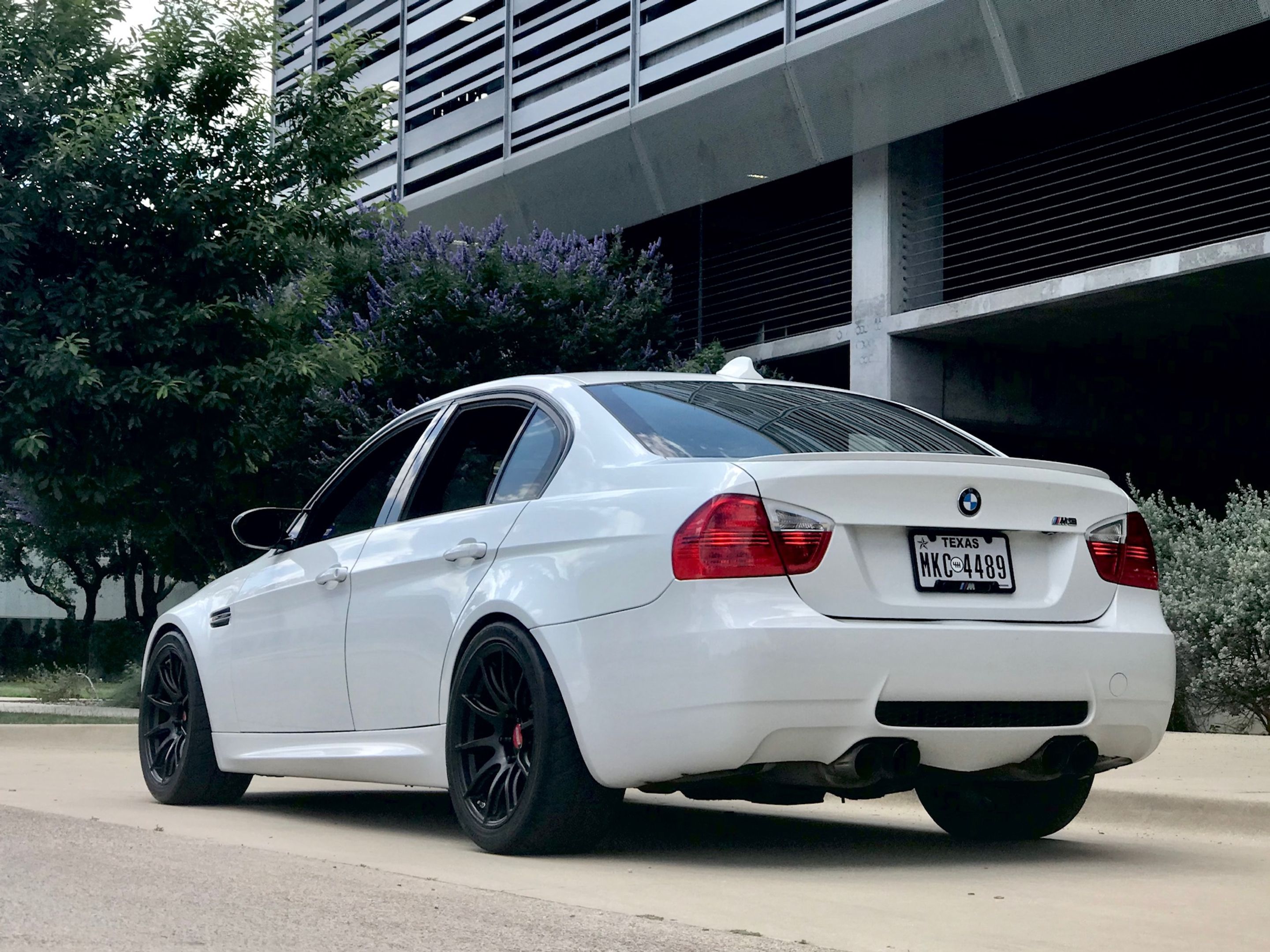 White BMW E90 Sedan M3 with 18" SM-10 Apex wheels in Satin Black