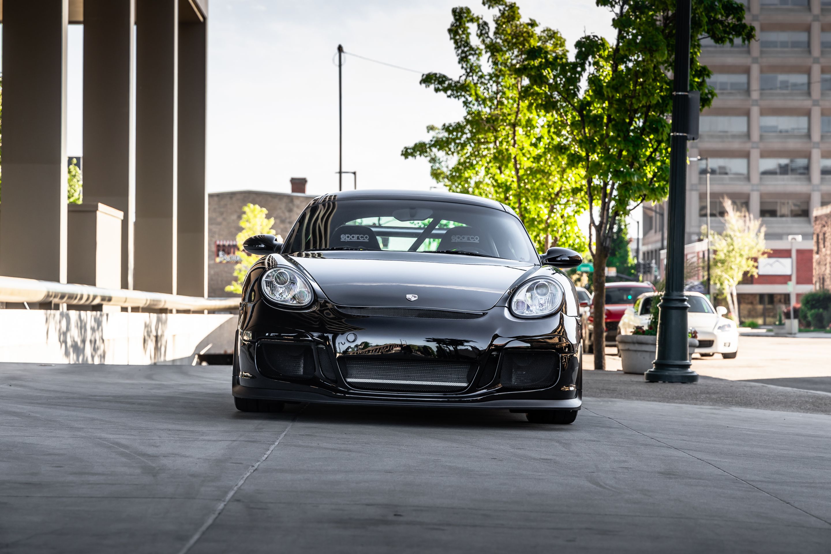Black Porsche 987 Cayman S with 18" VS-5RS Apex wheels in Brushed Clear
