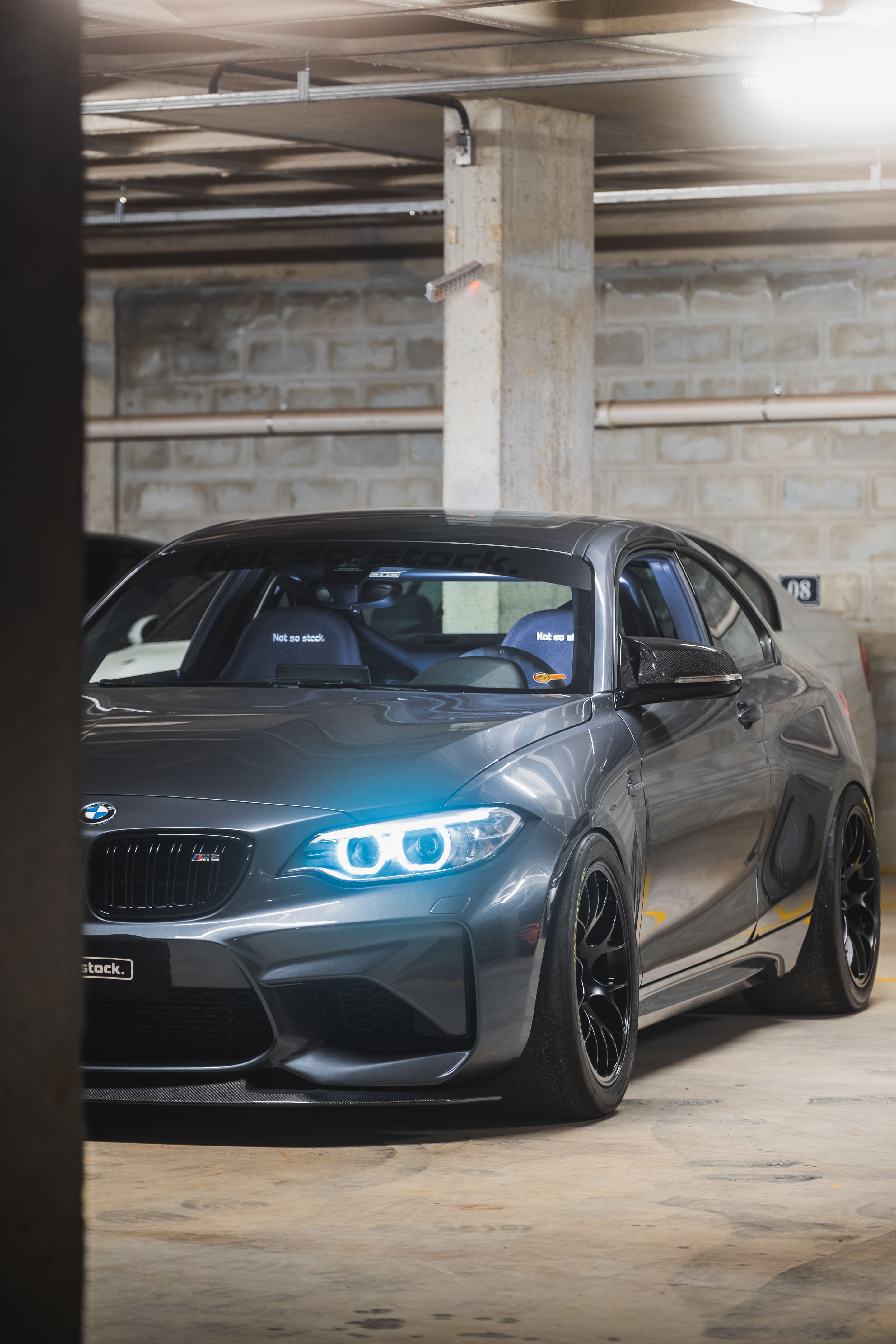 Black BMW F87 M2 with 18" EC-7 Apex wheels in Satin Black