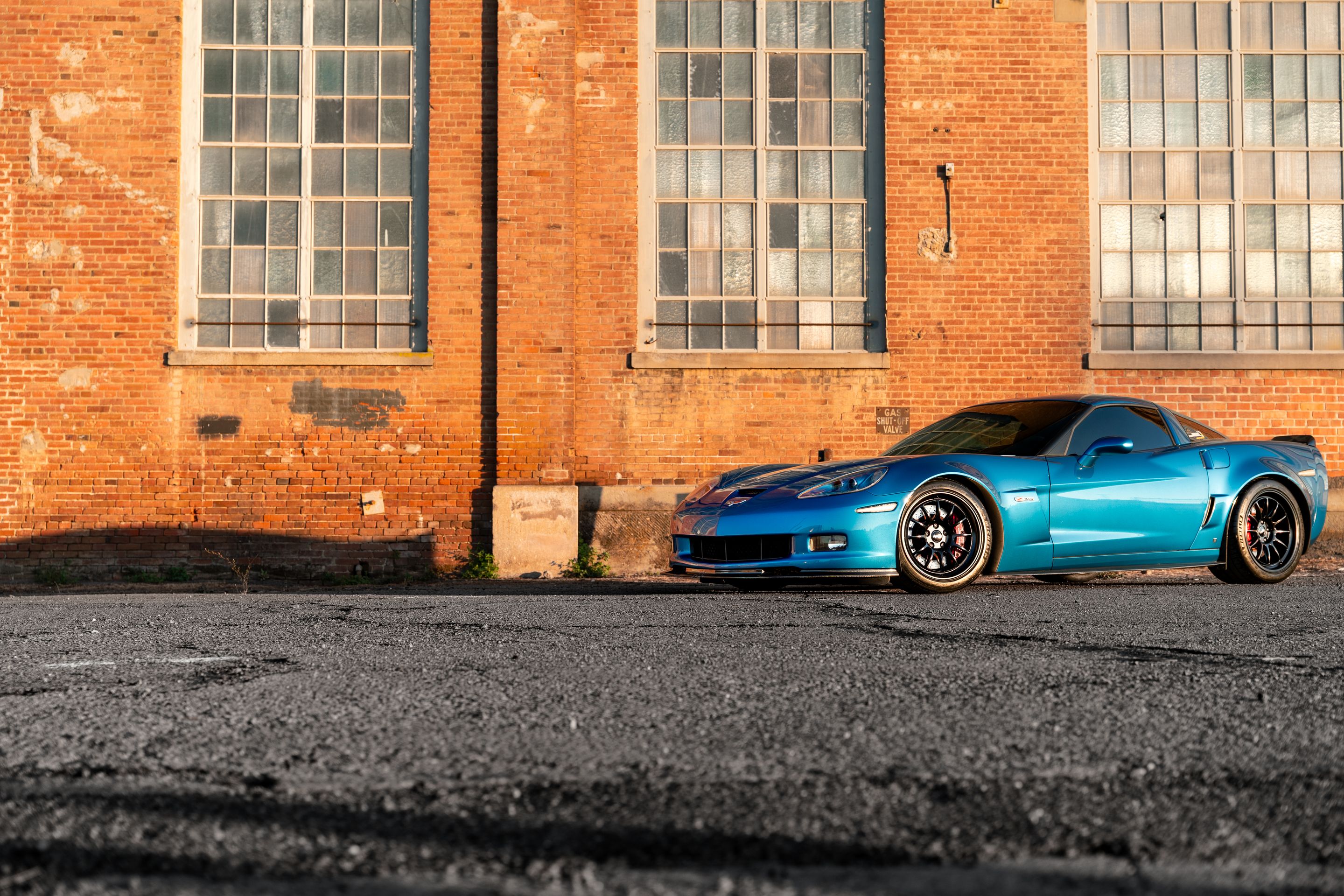 Blue Chevrolet C6 Corvette Z06 with 18"/19" TEST-S Apex wheels in Satin Black
