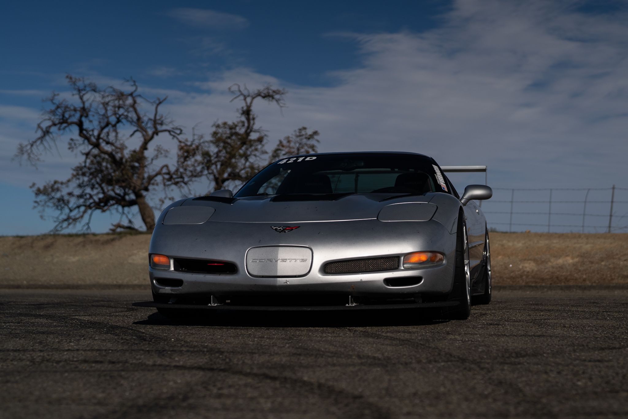 Silver Chevrolet C5 Corvette Z06 with 18" VS-5RS Apex wheels in Brushed Clear
