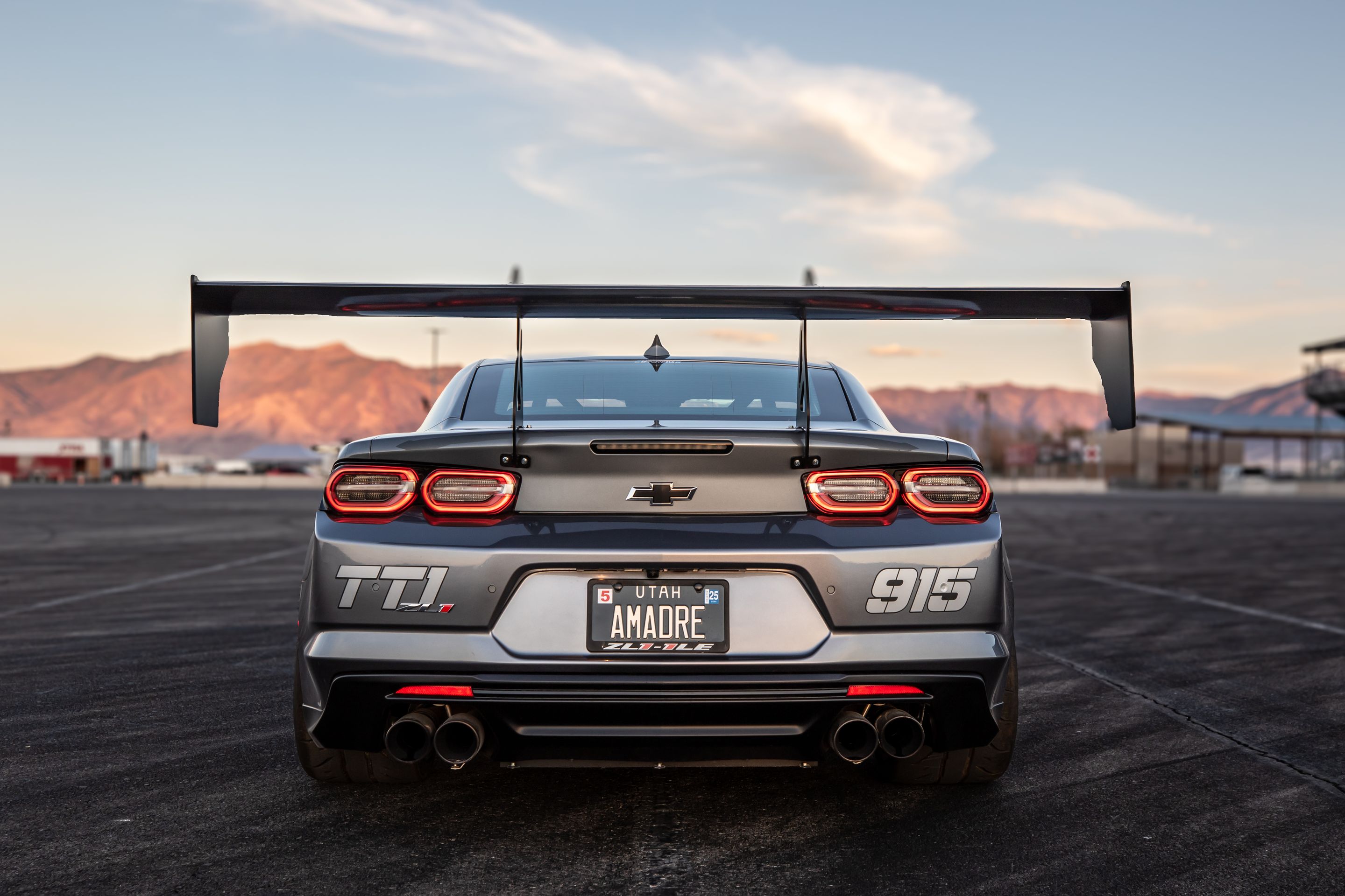 Grey Chevrolet 6th Gen Camaro ZL1 1LE with 18" VS-5RS Apex wheels in Brushed Clear