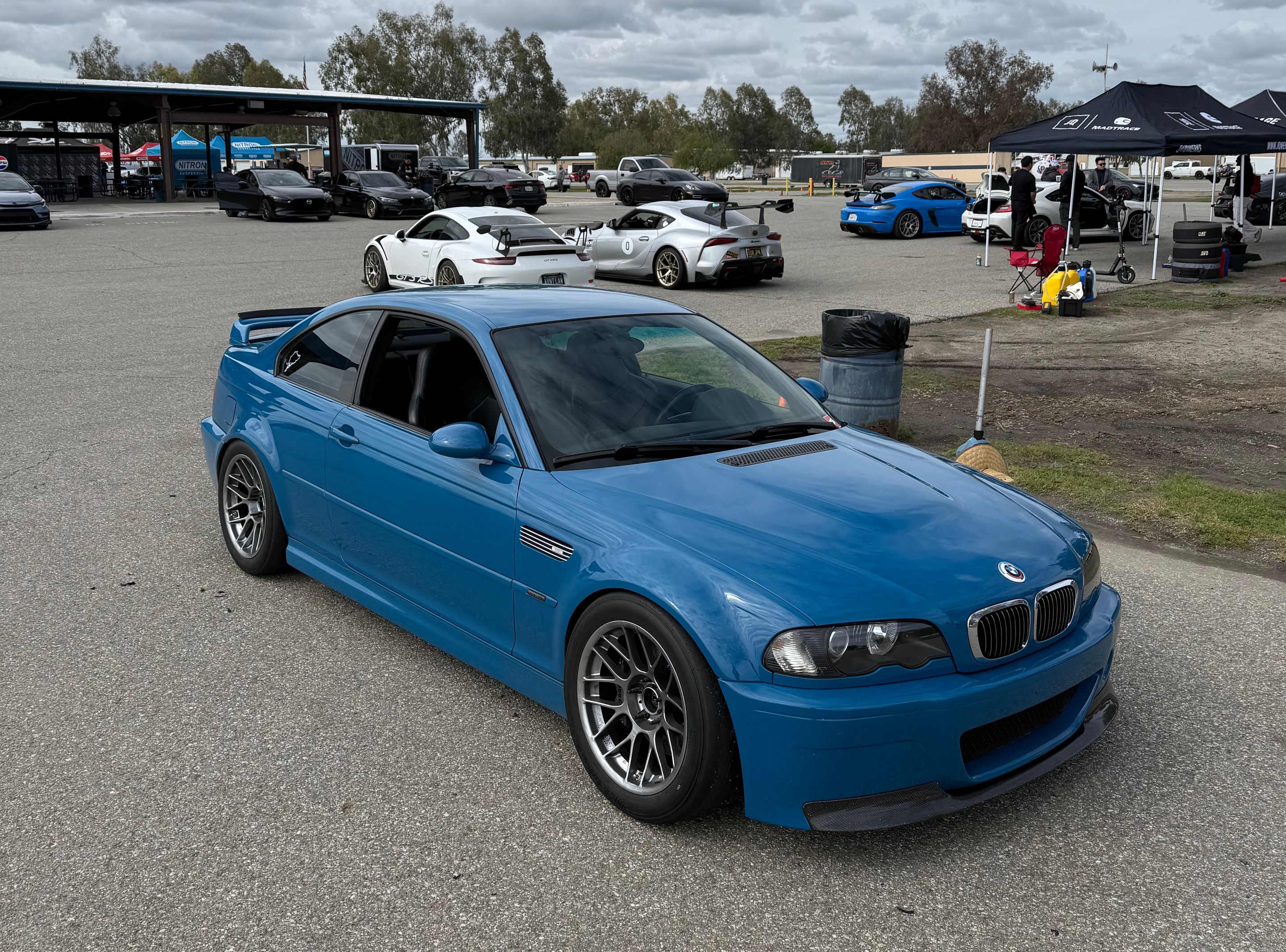 Blue BMW E46 M3 with 17" ARC-8 Apex wheels in Hyper Black
