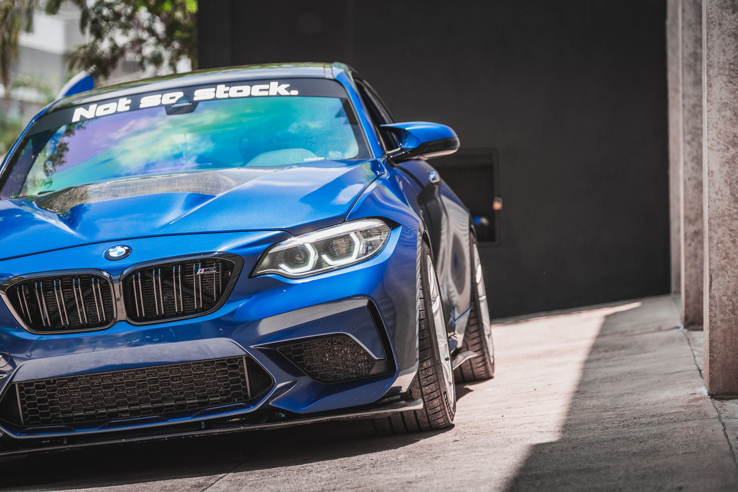 Blue BMW F87 M2 with 19" SM-10 Apex wheels in Race Silver