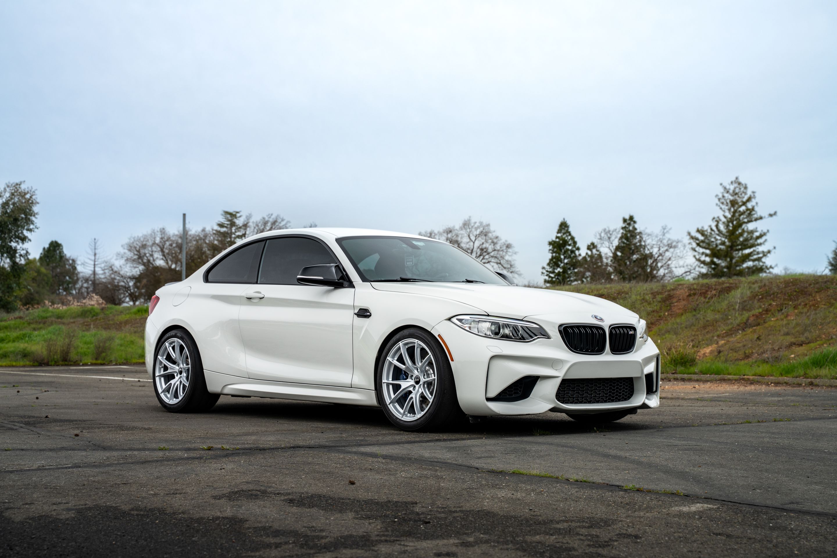 White BMW F87 M2 with 18" VS-5 Apex wheels in Race Silver