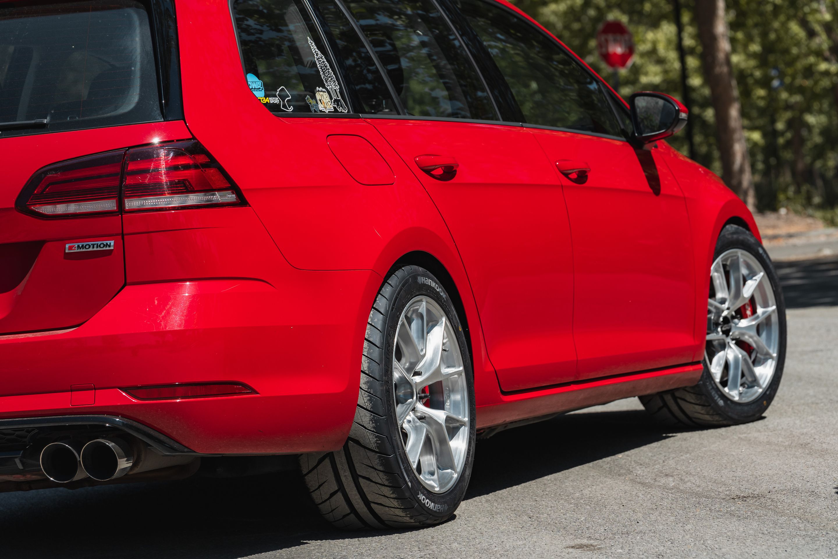 Red VW MK7 Alltrack/SportWagen Golf SportWagen with 17" VS-5RS Apex wheels in Brushed Clear