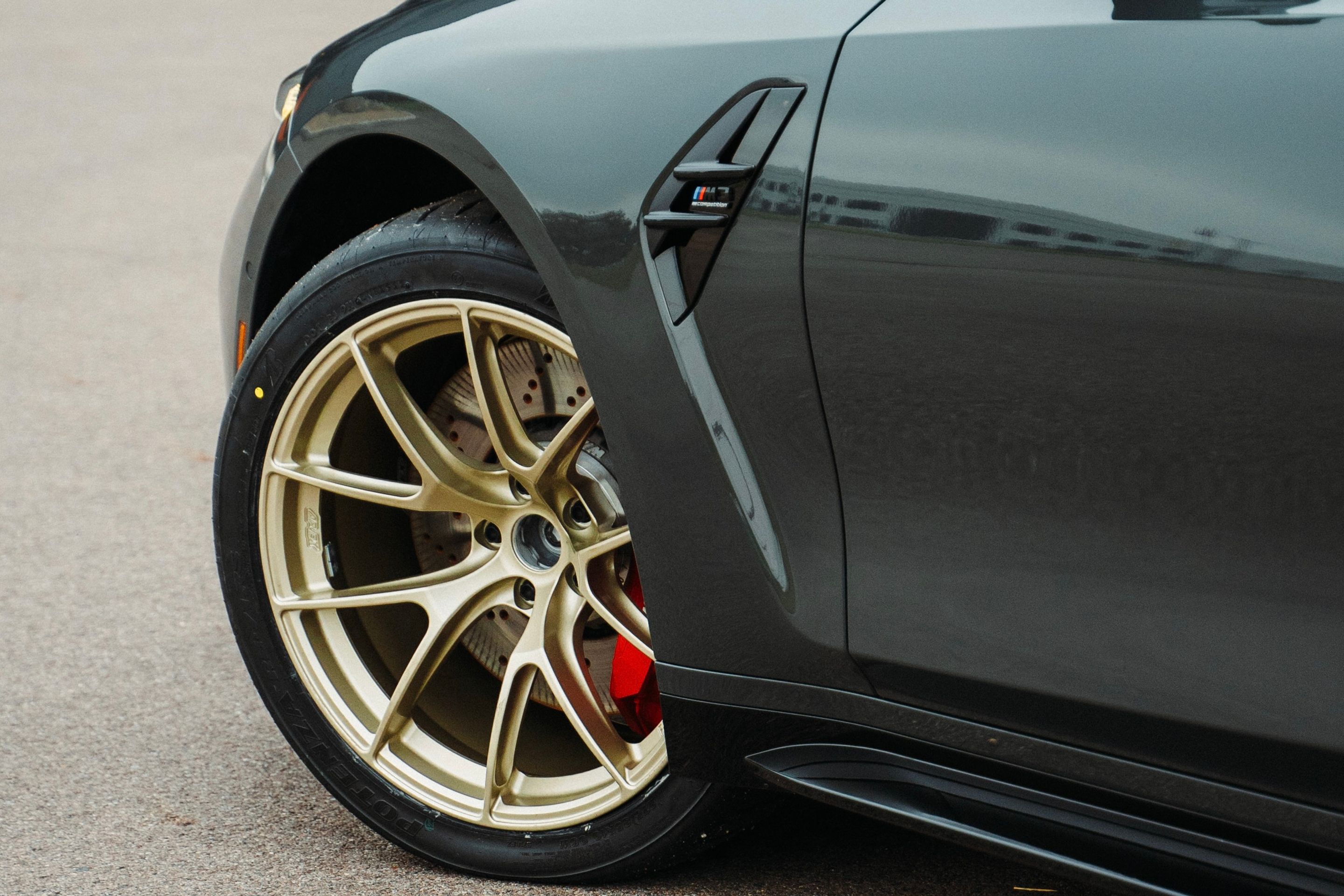 Grey BMW G80 M3 with 19" VS-5RS Apex wheels in Motorsport Gold