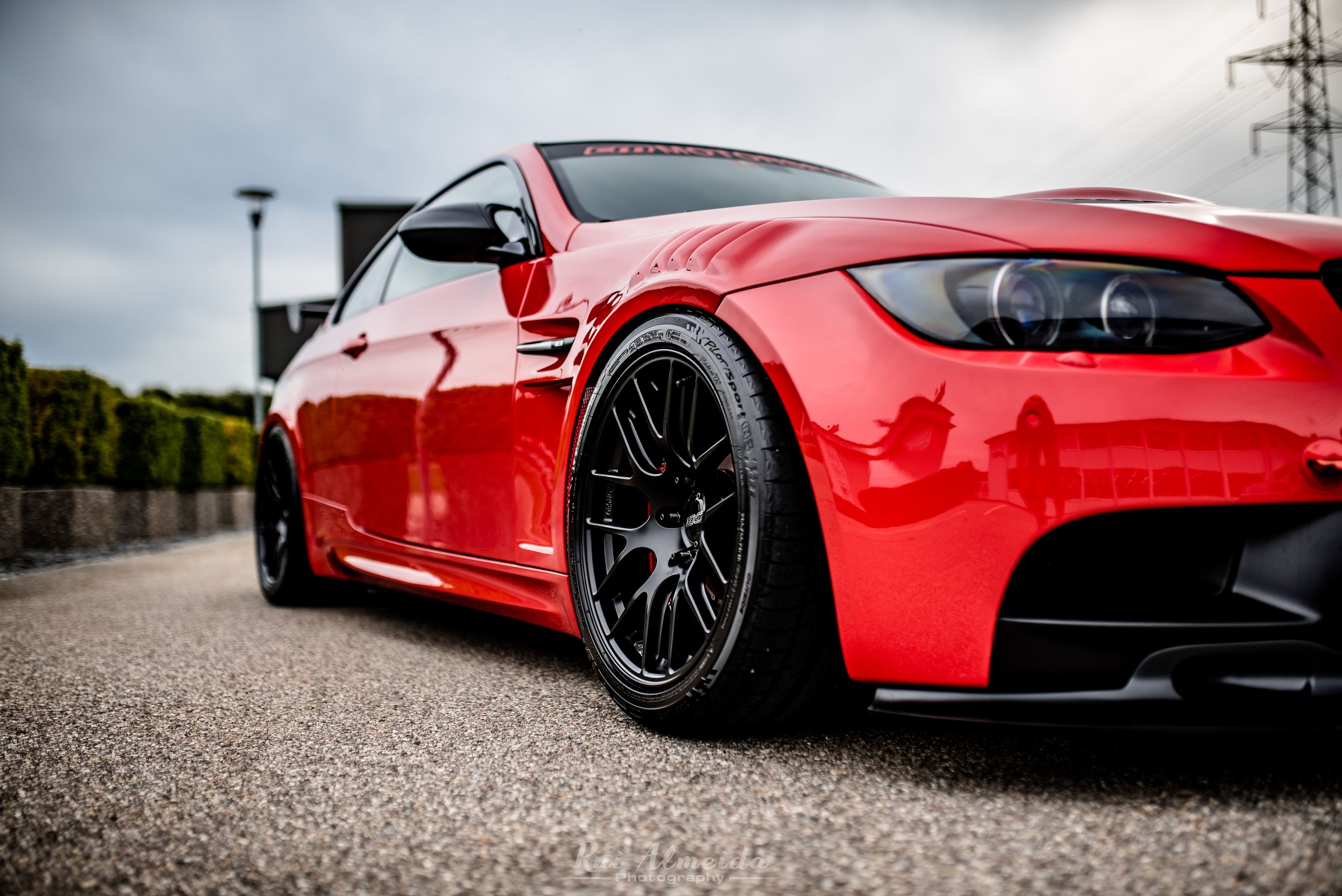 Red BMW E92 Coupe M3 with 18" EC-7R Apex wheels in Satin Black