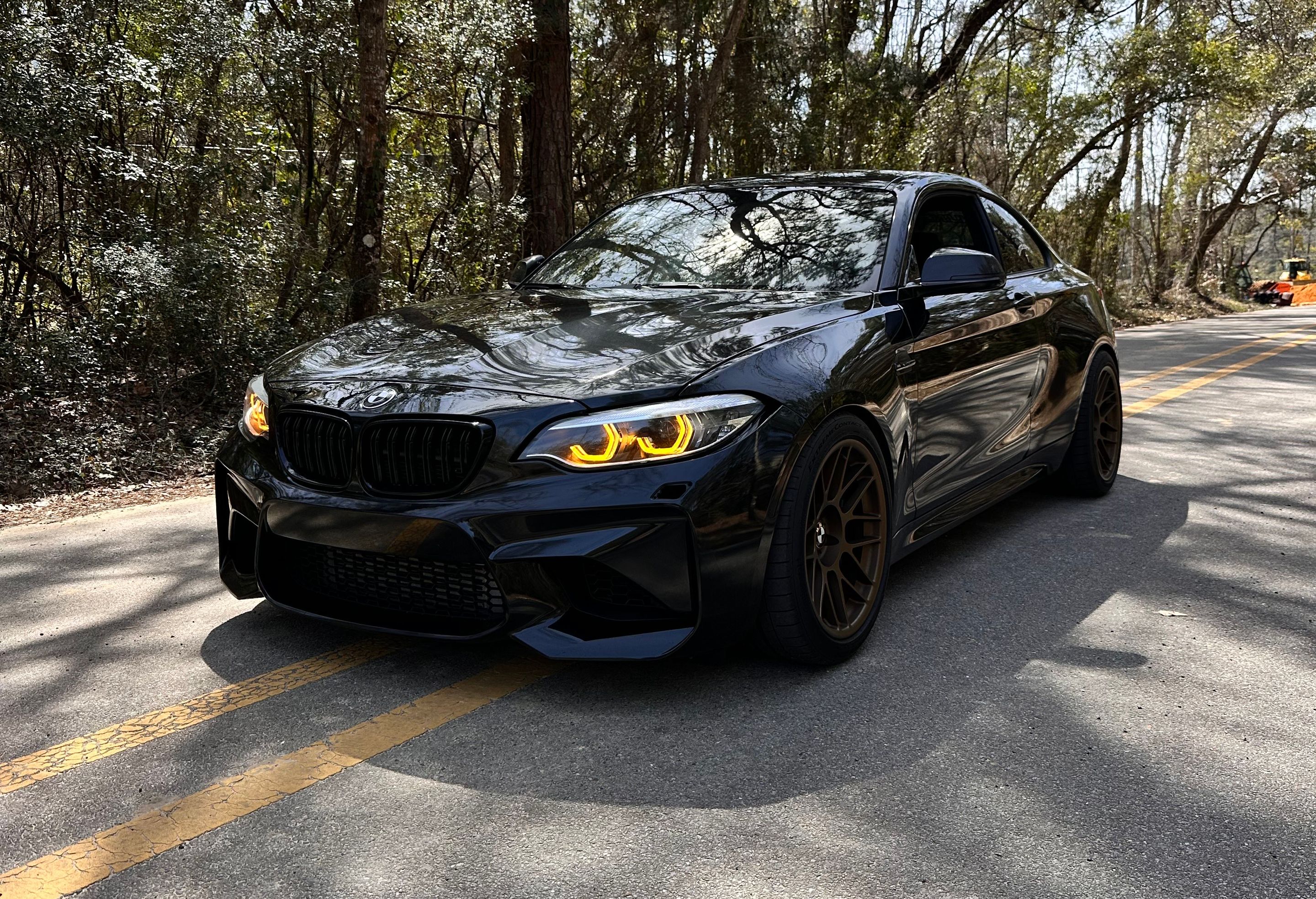 Black BMW F87 M2 with 18" ARC-8 Apex wheels in Satin Bronze