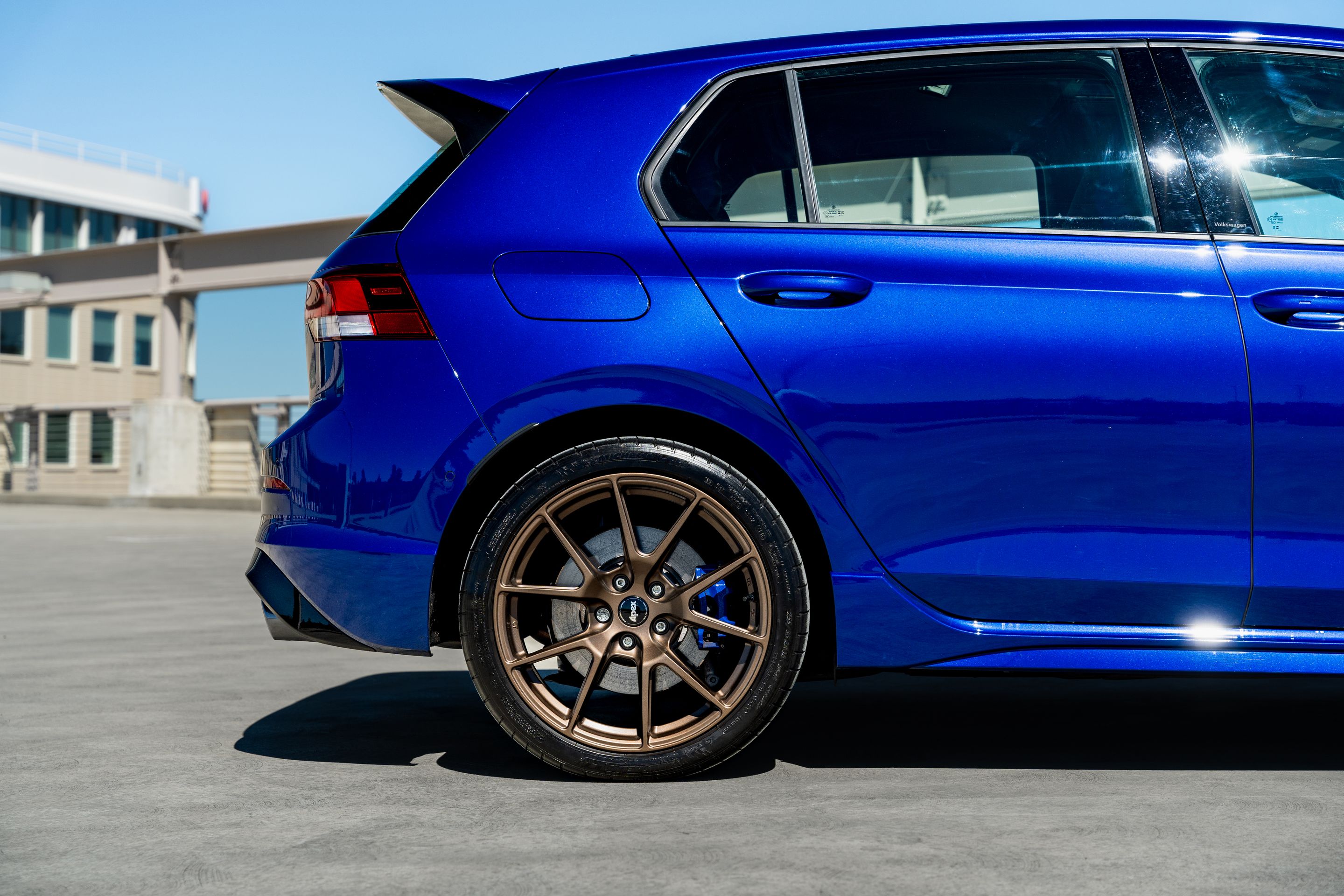 Blue VW MK8 Golf R with 18" VS-5 Apex wheels in Satin Bronze