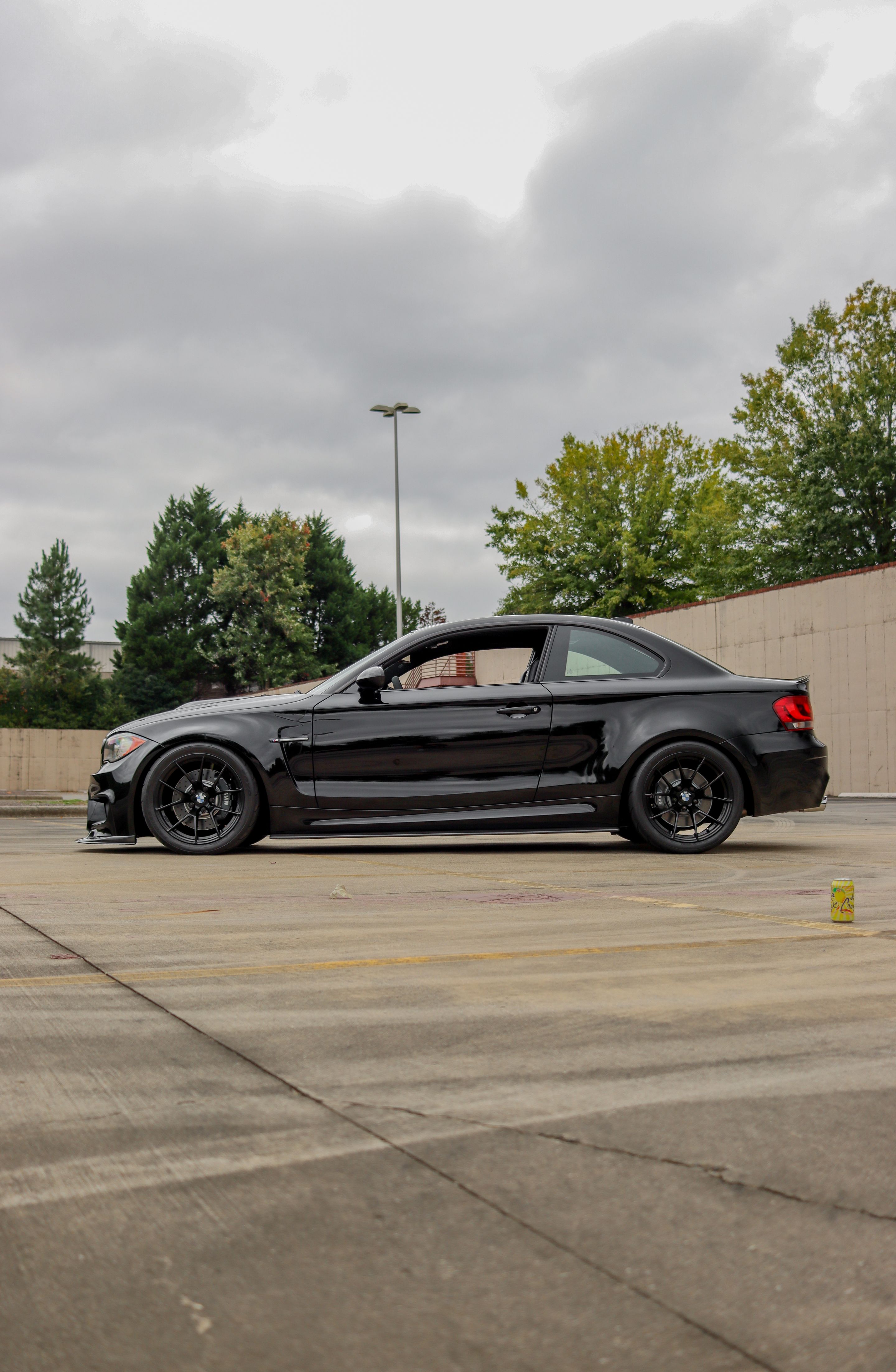 Black BMW E82 1M with 18" VS-5RS Apex wheels in Satin Black