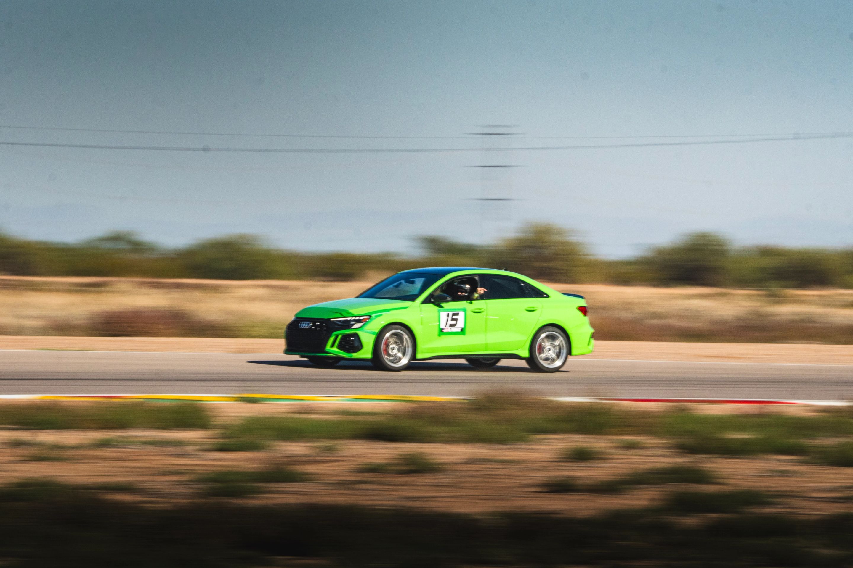 Green Audi 8Y RS 3 with 18" VS-5RS Apex wheels in Brushed Clear