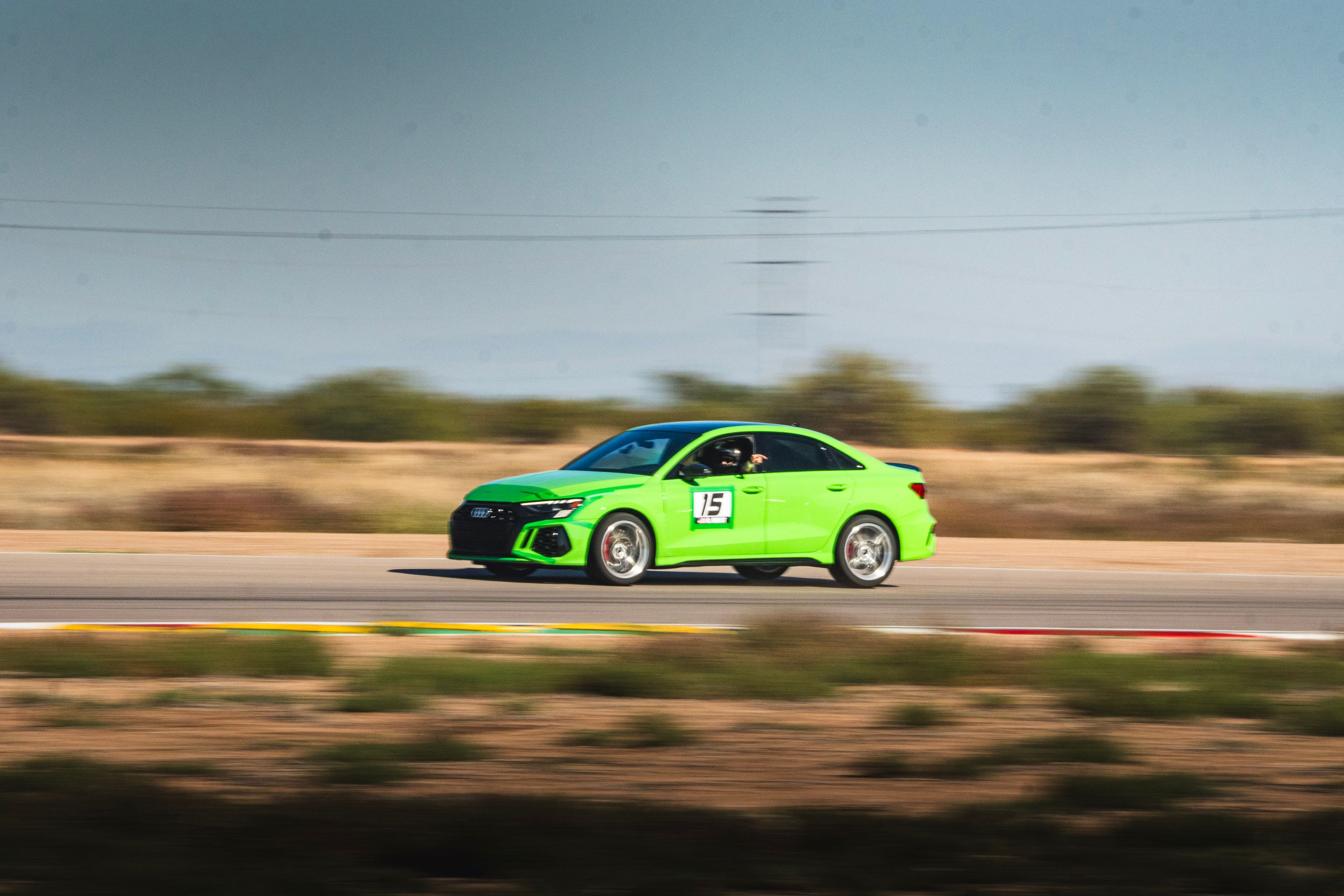 Green Audi 8Y RS 3 with 18" VS-5RS Apex wheels in Brushed Clear