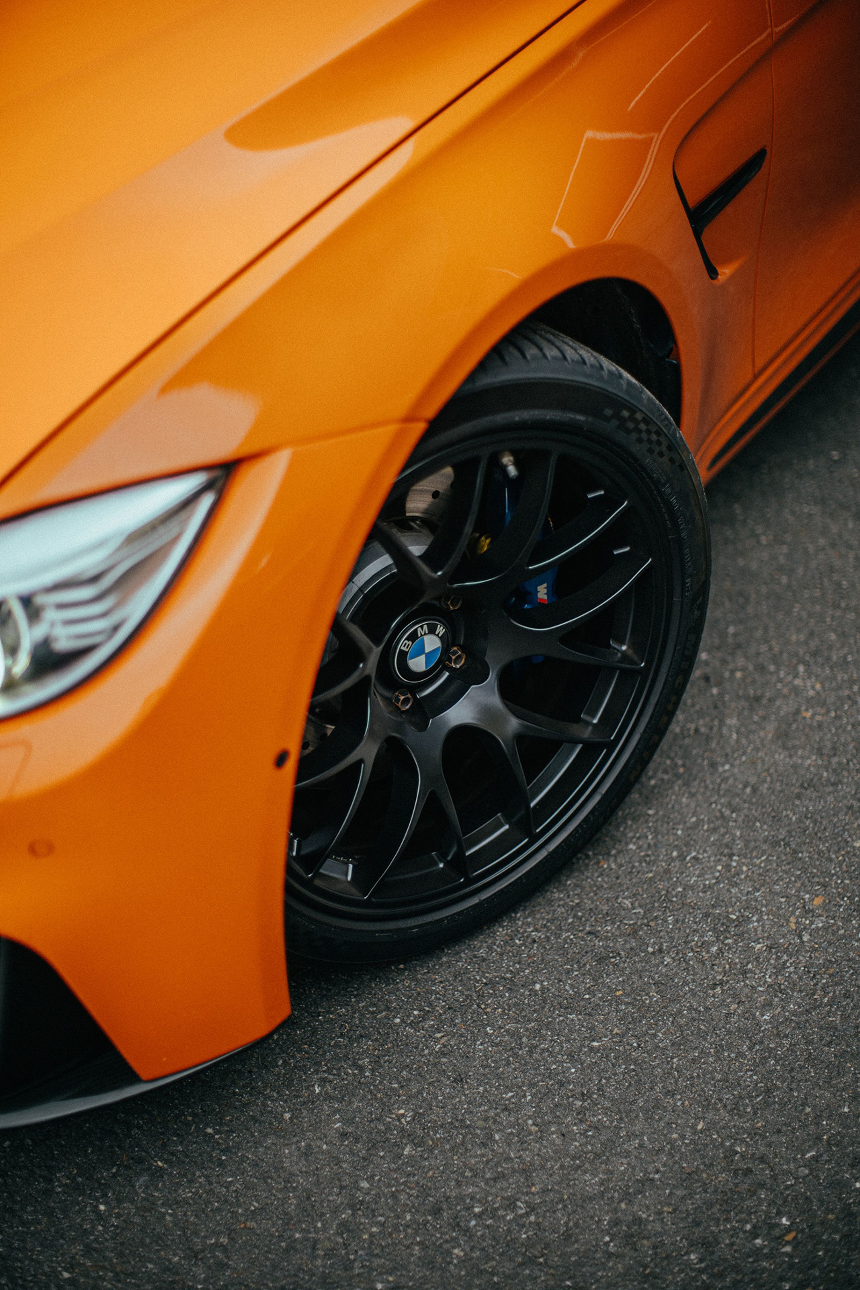 Orange BMW F80 M3 with 18" EC-7 Apex wheels in Satin Black