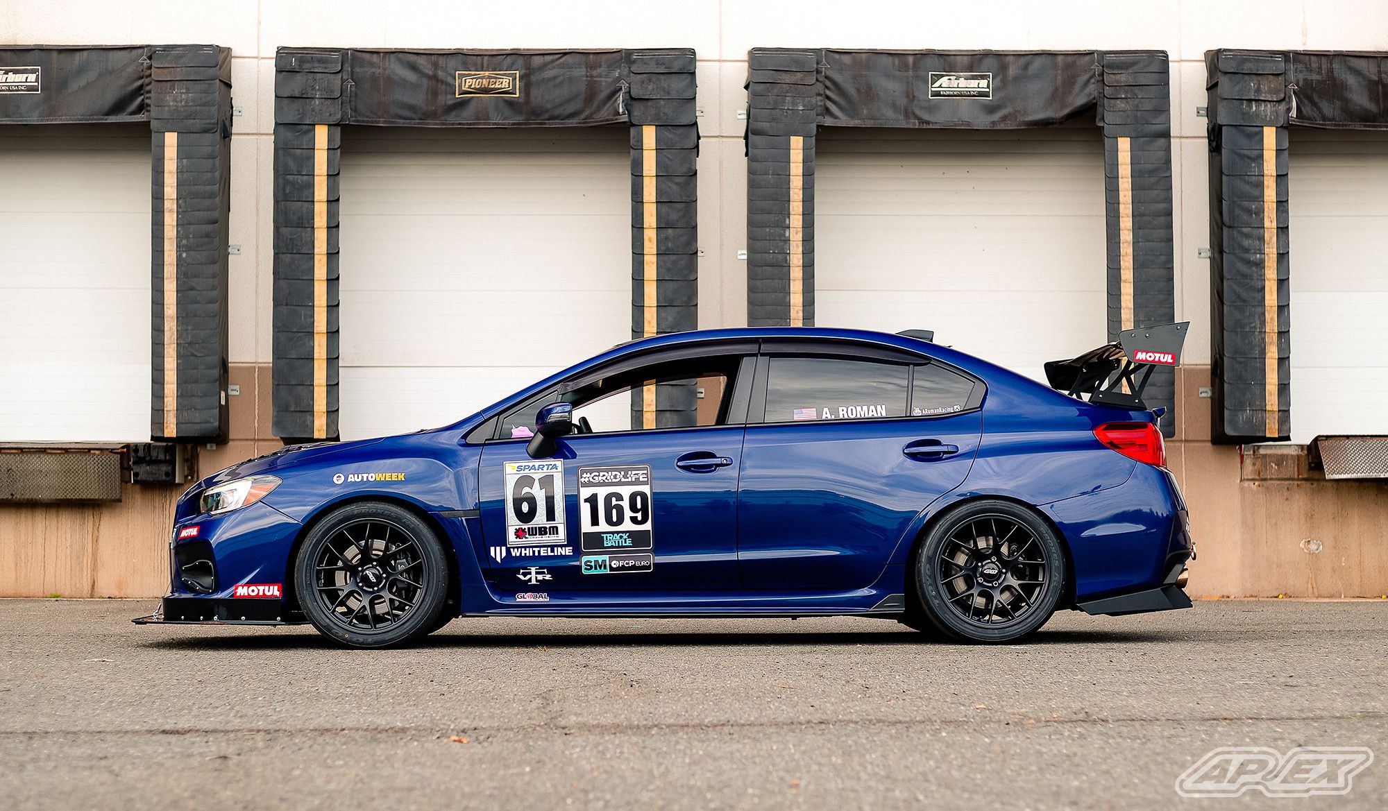 Blue Subaru VA WRX STI with 18" EC-7 Apex wheels in Satin Black