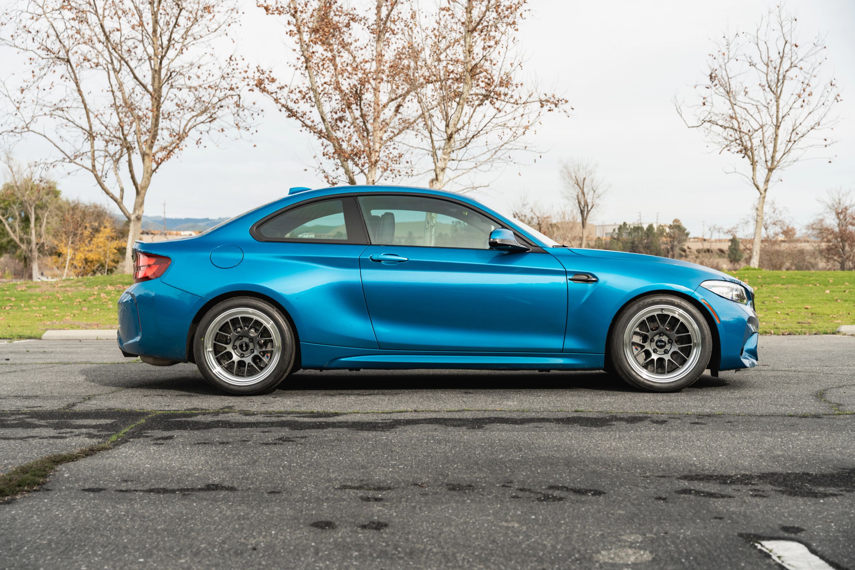 Blue BMW F87 M2 with 18" ML-7RT Apex wheels in Machined Lip Anthracite
