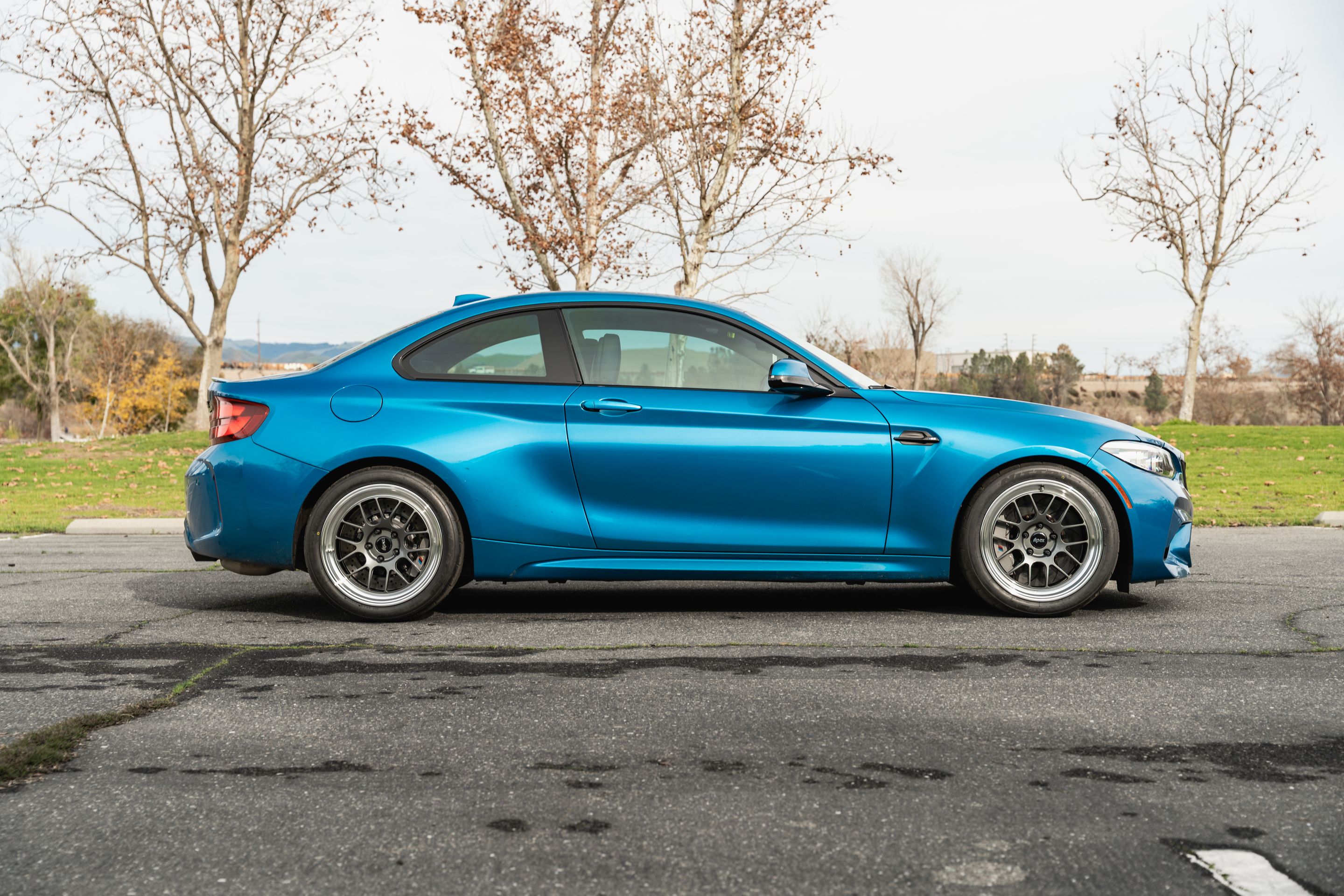 Blue BMW F87 M2 with 18" ML-7RT Apex wheels in Machined Lip Anthracite