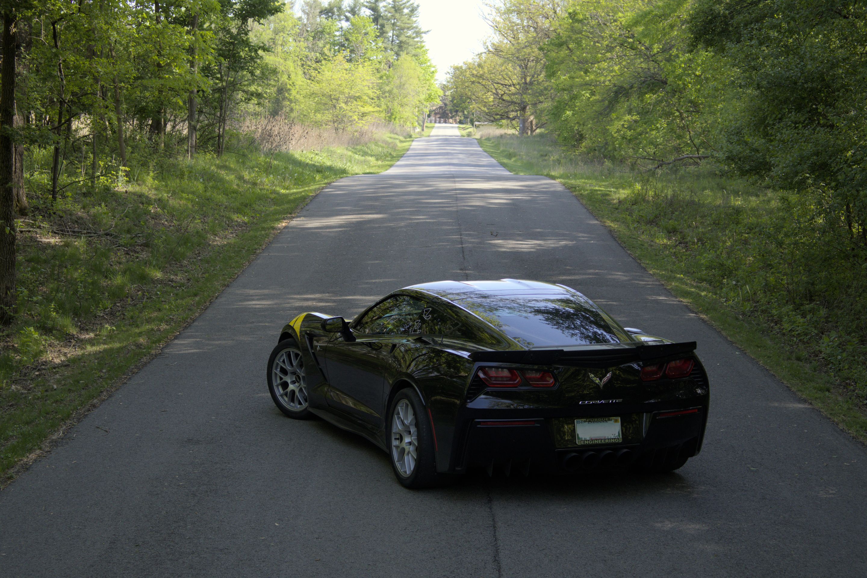 Grey Chevrolet C7 Corvette Stingray/Z51 with 18" EC-7 Apex wheels in Race Silver