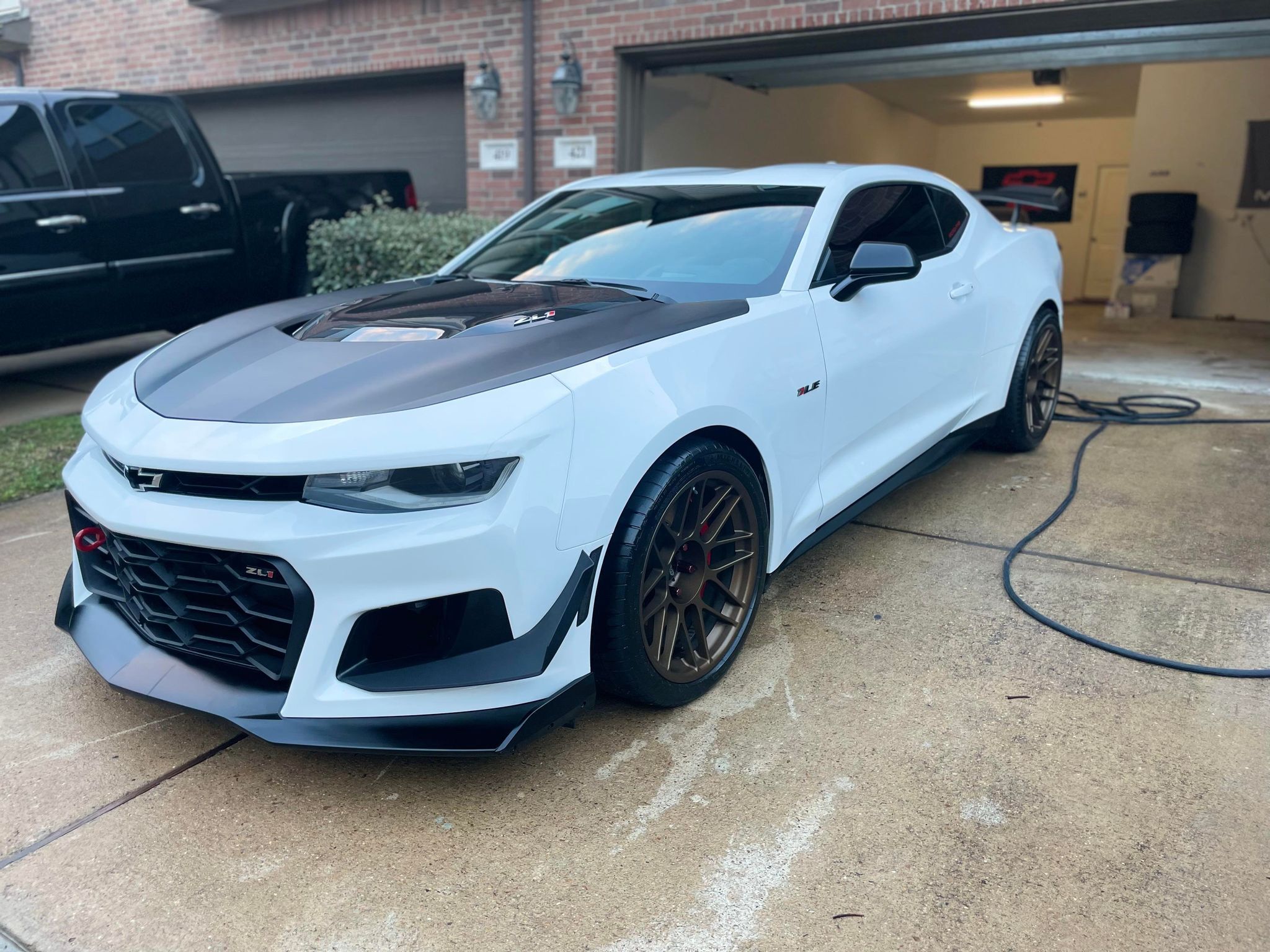 White Chevrolet 6th Gen Camaro ZL1 1LE with 19" ARC-8 Apex wheels in Satin Bronze