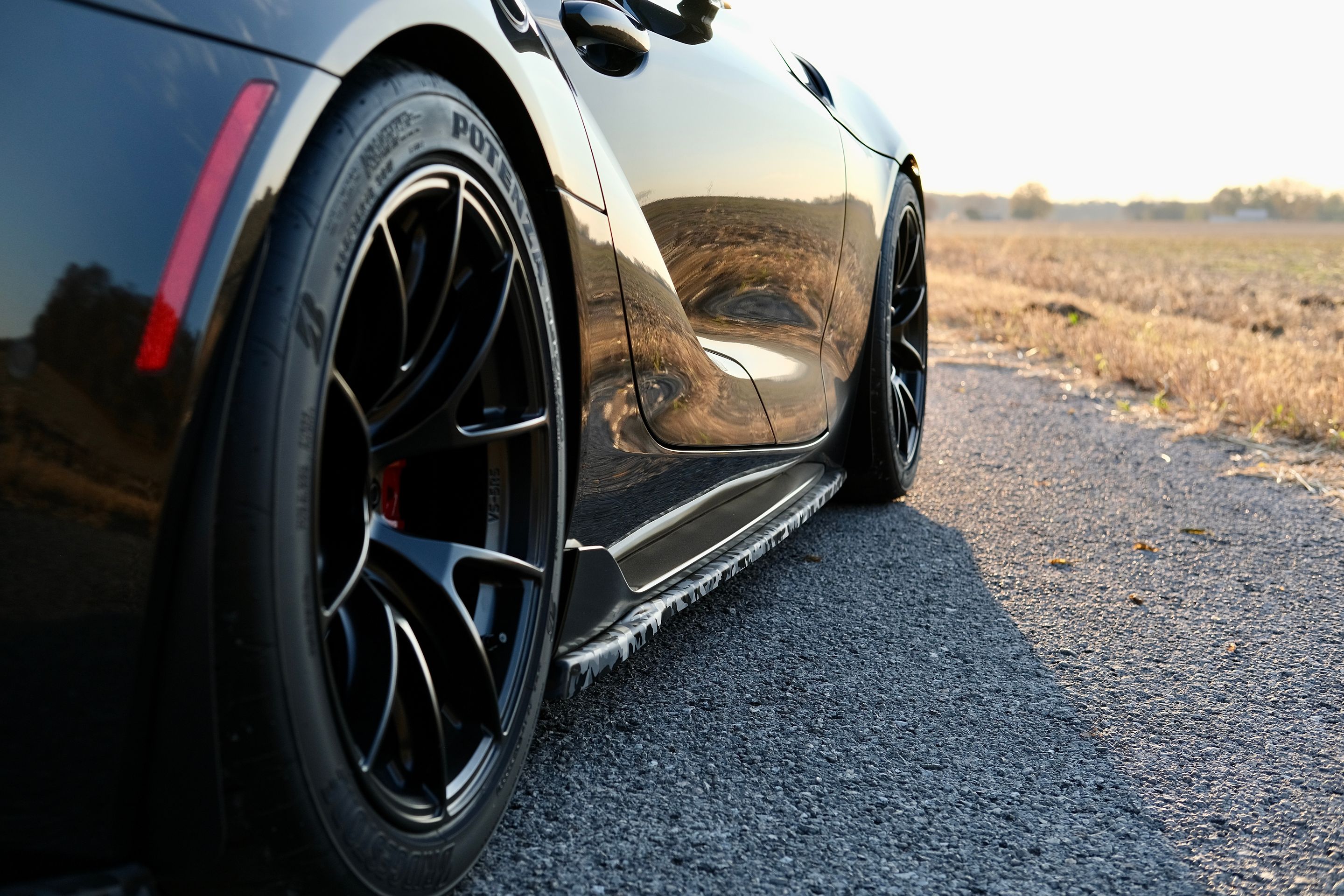 Black Toyota GR Supra with 18" VS-5RS Apex wheels in Satin Black