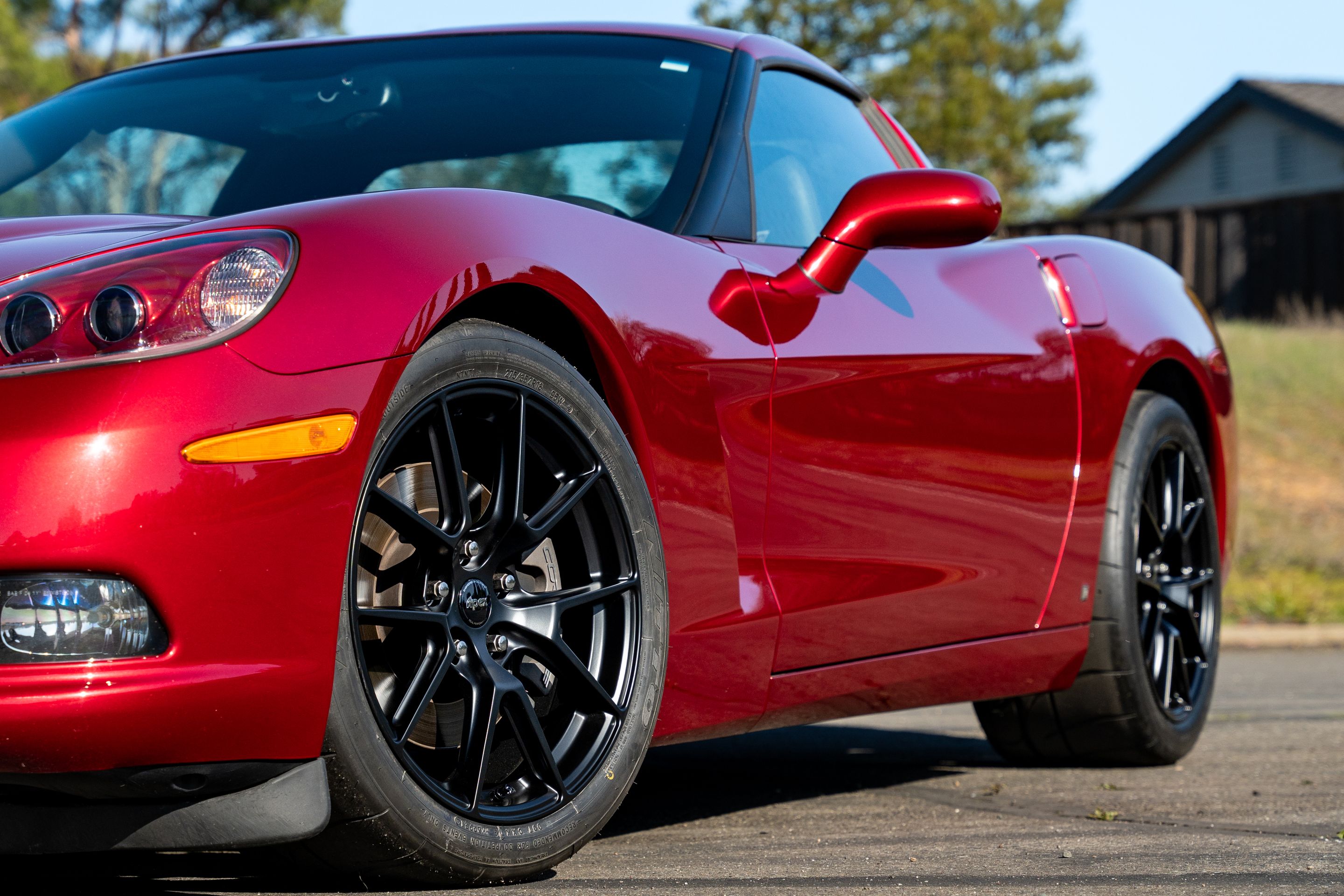 Red Chevrolet C6 Corvette Base/Z51 with 18" VS-5 Apex wheels in Satin Black