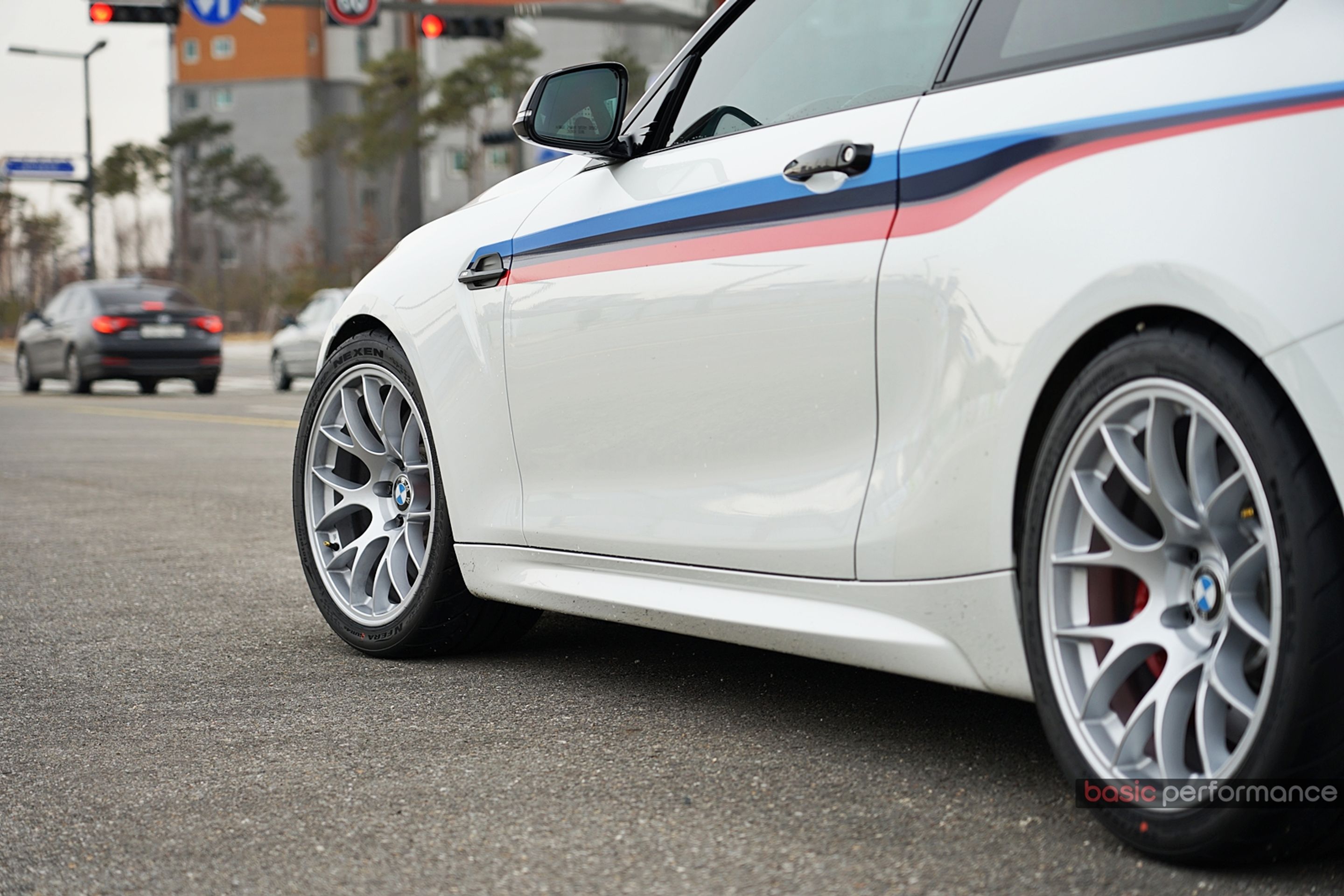 White BMW F87 M2 with 18" EC-7 Apex wheels in Race Silver