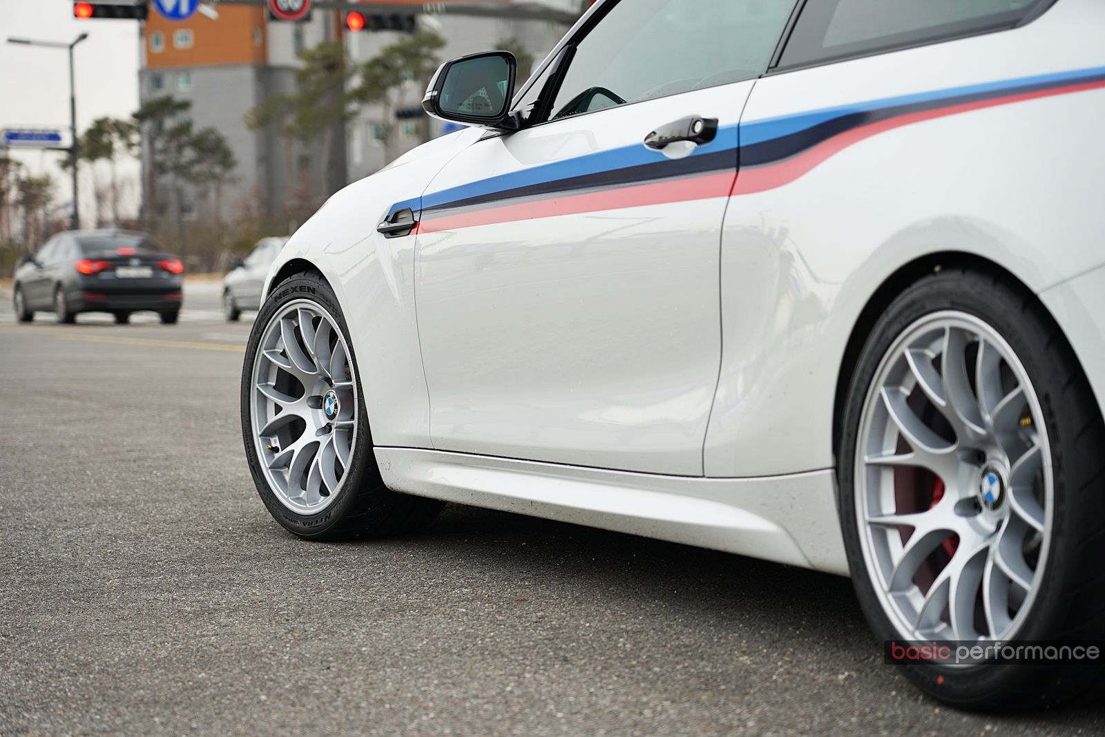 White BMW F87 M2 with 18" EC-7 Apex wheels in Race Silver