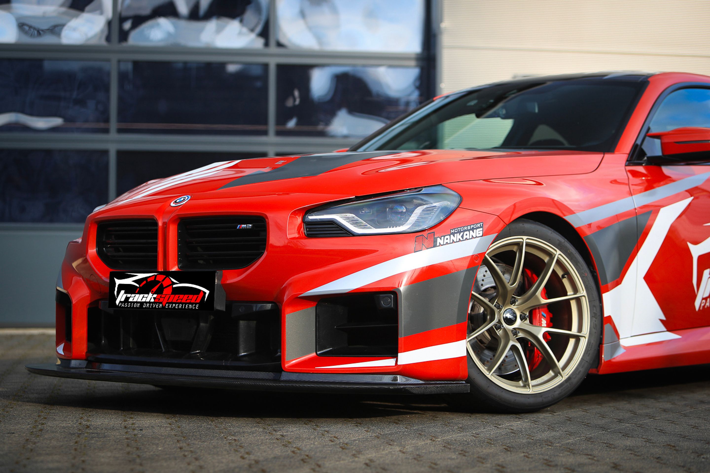 Red BMW G87 M2 with 19" VS-5RS Apex wheels in Motorsport Gold