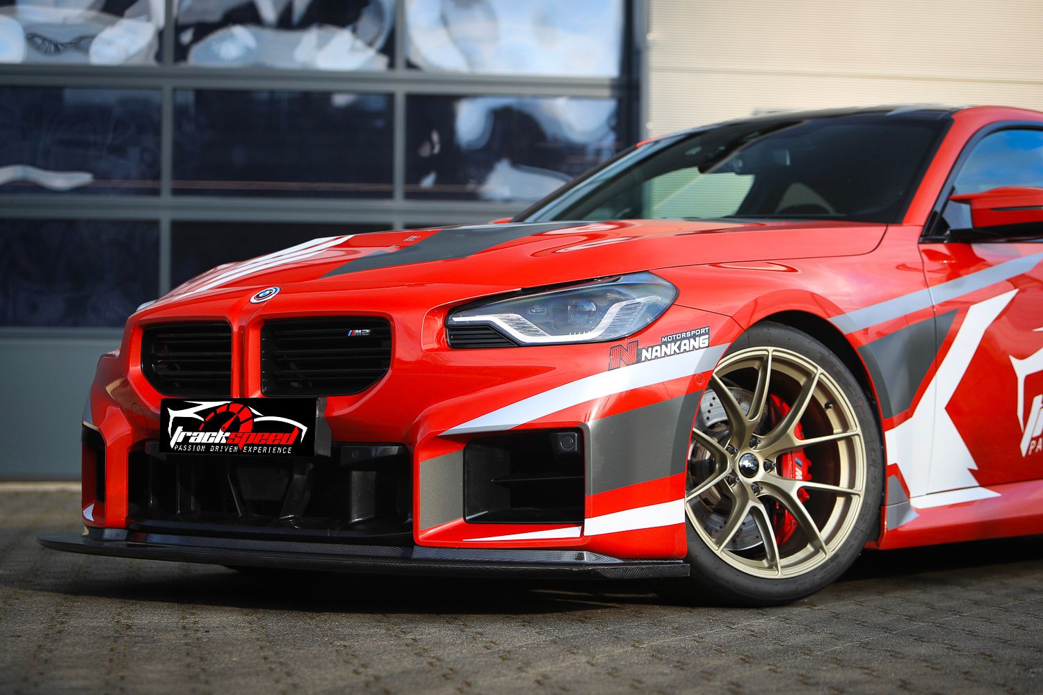 Red BMW G87 M2 with 19" VS-5RS Apex wheels in Motorsport Gold