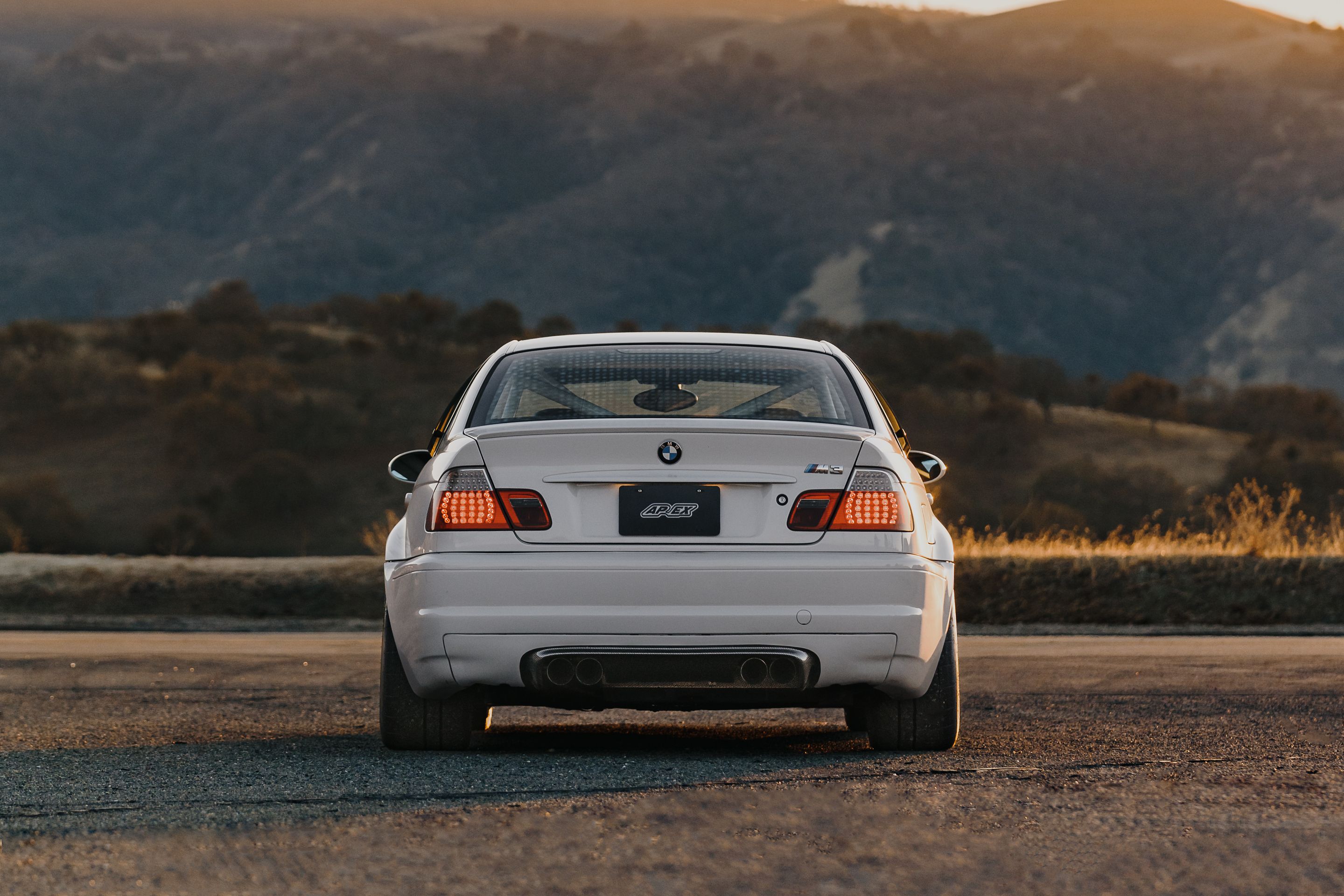 White BMW E46 M3 with 18" EC-7 Apex wheels in Race Silver