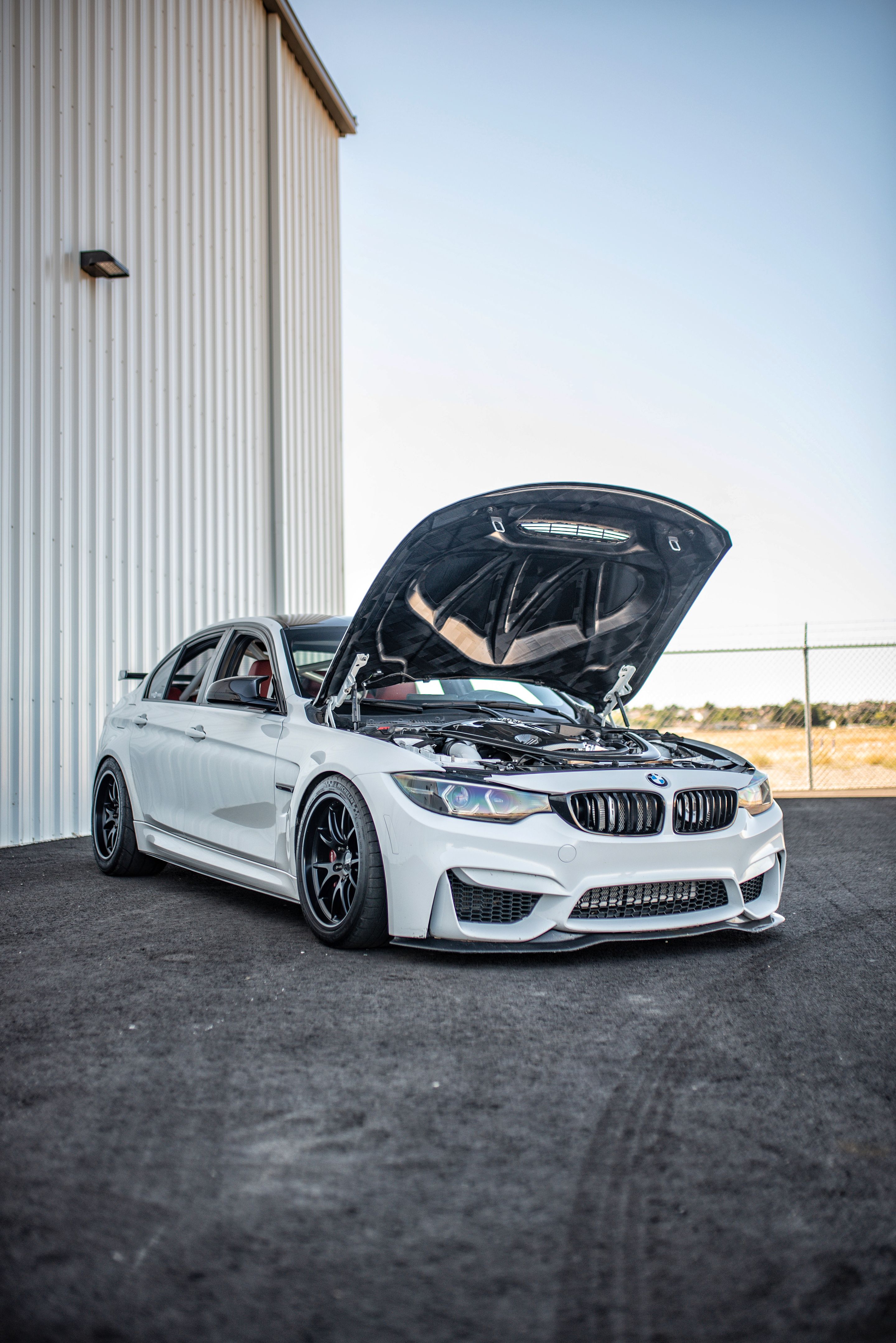 White BMW F80 M3 with 18" FL-5 Apex wheels in Satin Black