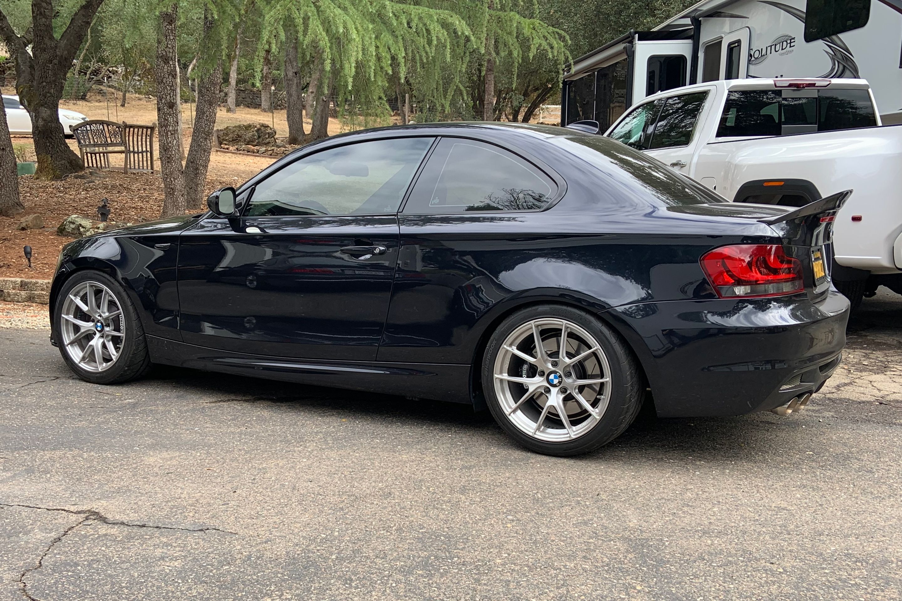 Black BMW E82 Coupe 1 Series with 18" VS-5RS Apex wheels in Brushed Clear
