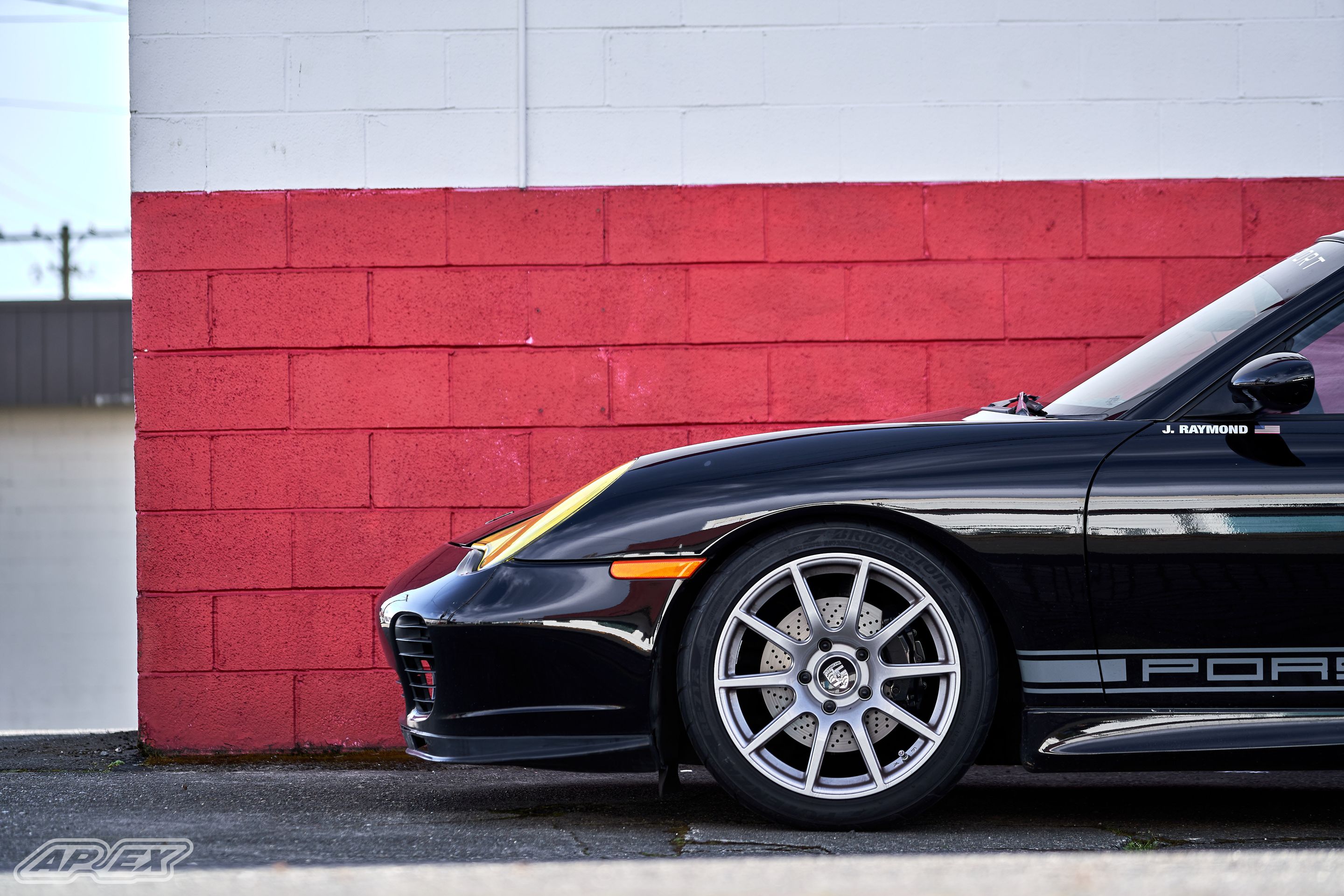 Black Porsche 911 996 Carrera with 18" SM-10 Apex wheels in Race Silver