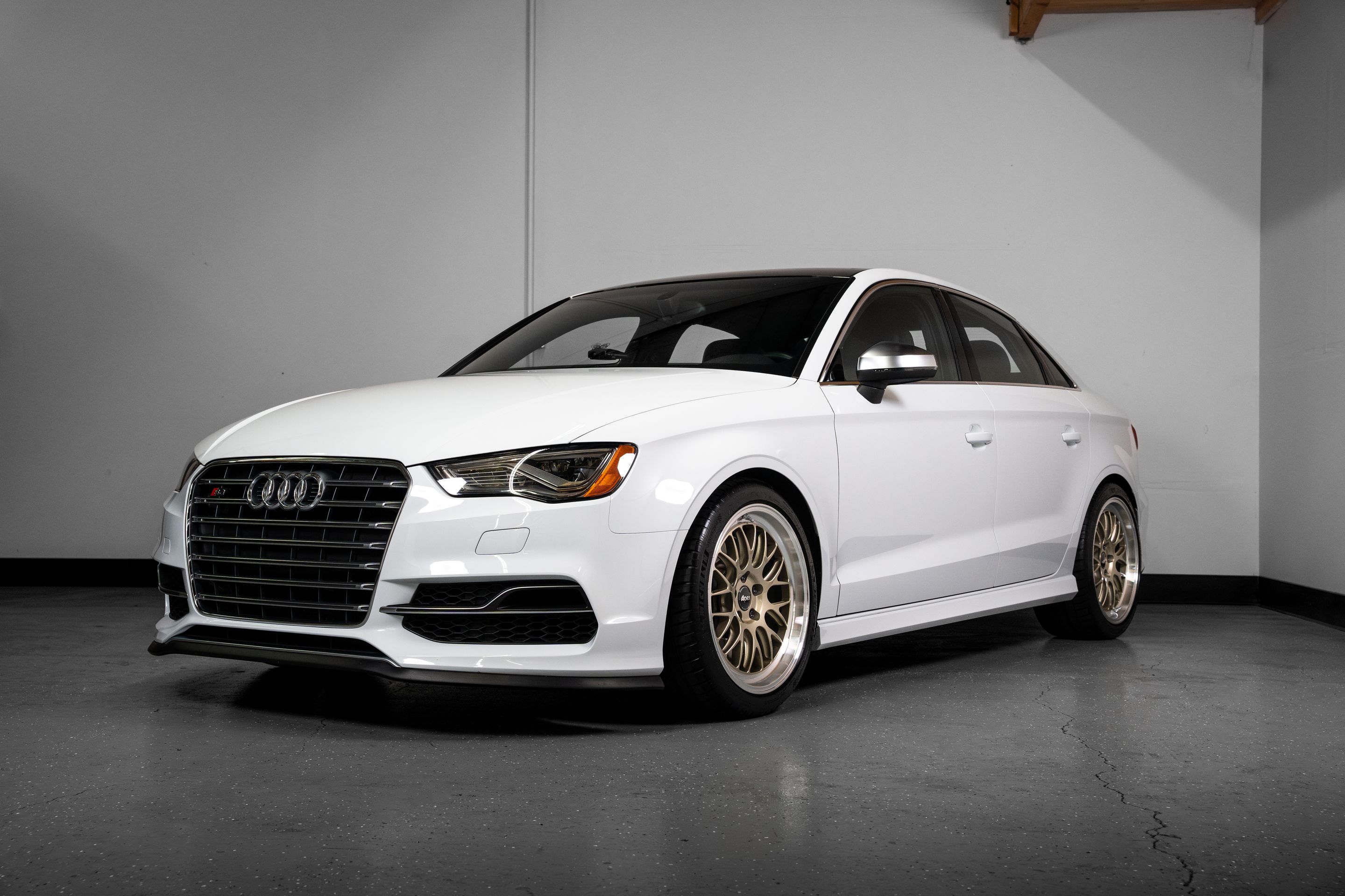 White Audi 8V S3 with 18" ML-10RT Apex wheels in Machined Lip Gloss Motorsport Gold