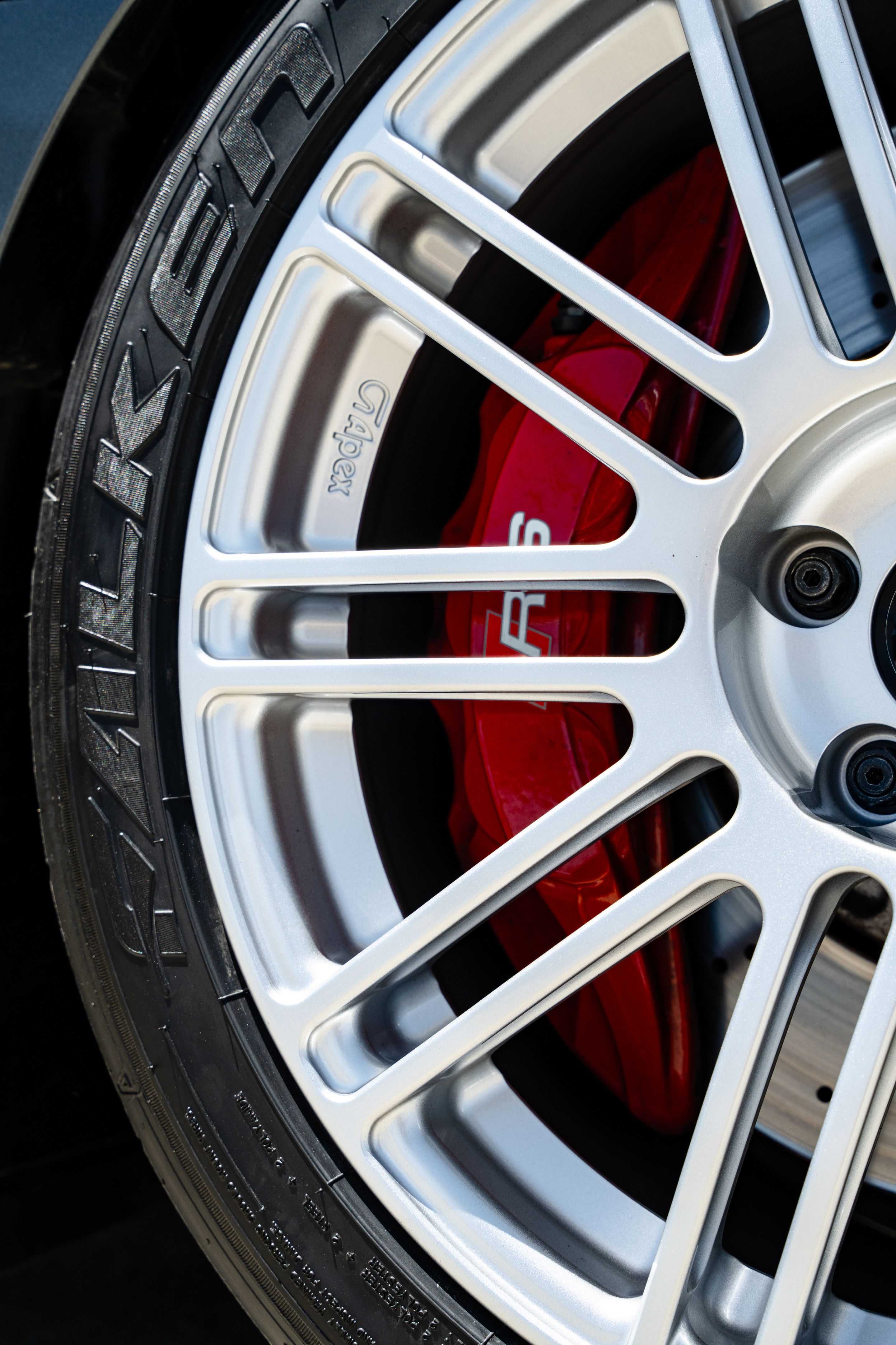 Grey Audi 8Y RS 3 with 18" TC-10RT Apex wheels in Race Silver