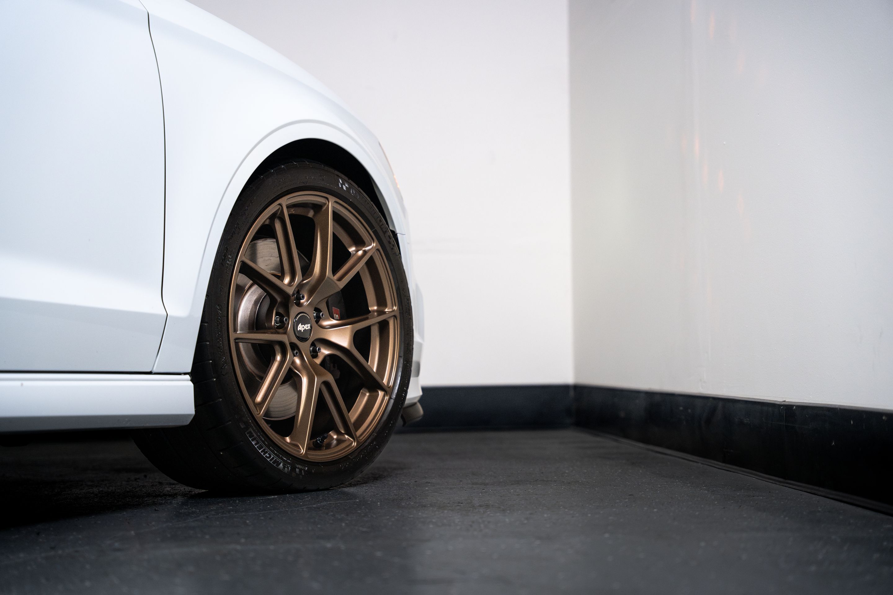 White Audi 8V S3 with 18" VS-5 Apex wheels in Satin Bronze