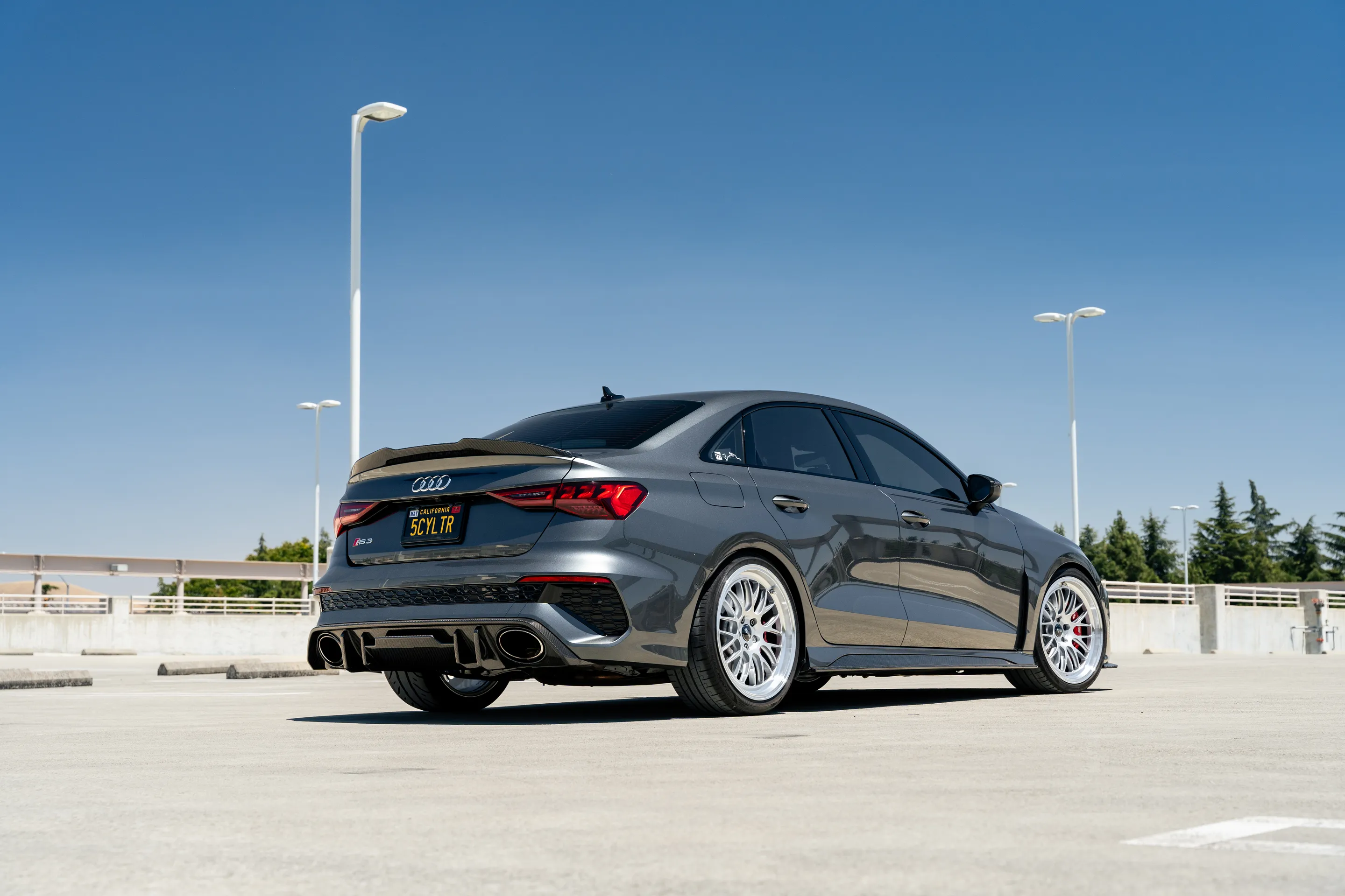 Grey Audi 8Y RS 3 with 19" ML-10RT Apex wheels in Machined Lip Race Silver