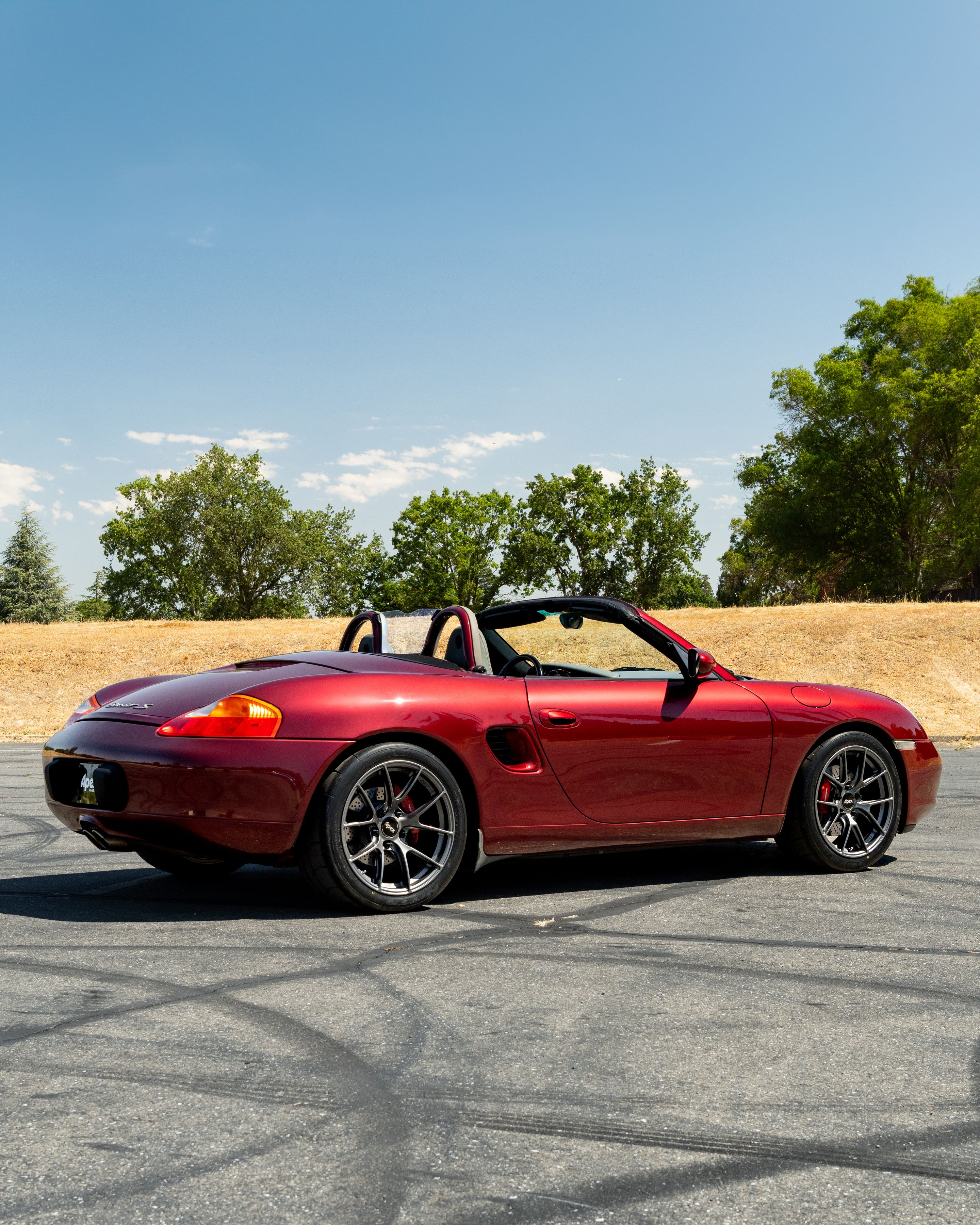 Red Porsche 986 Boxster with 18" VS-5RS Apex wheels in Anthracite