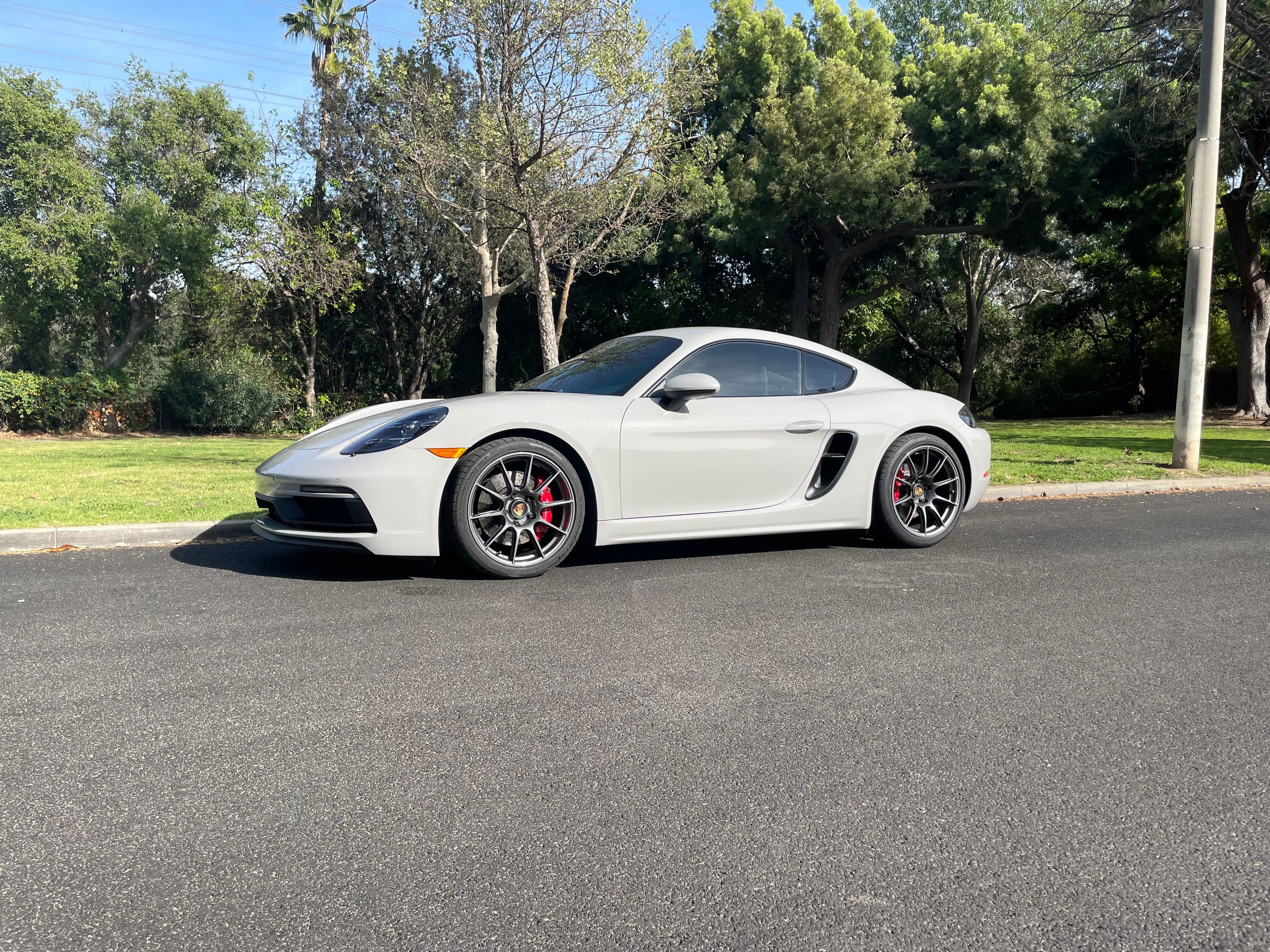 Grey Porsche 718 Cayman GTS 2.5L with 19" SM-10 Apex wheels in Anthracite