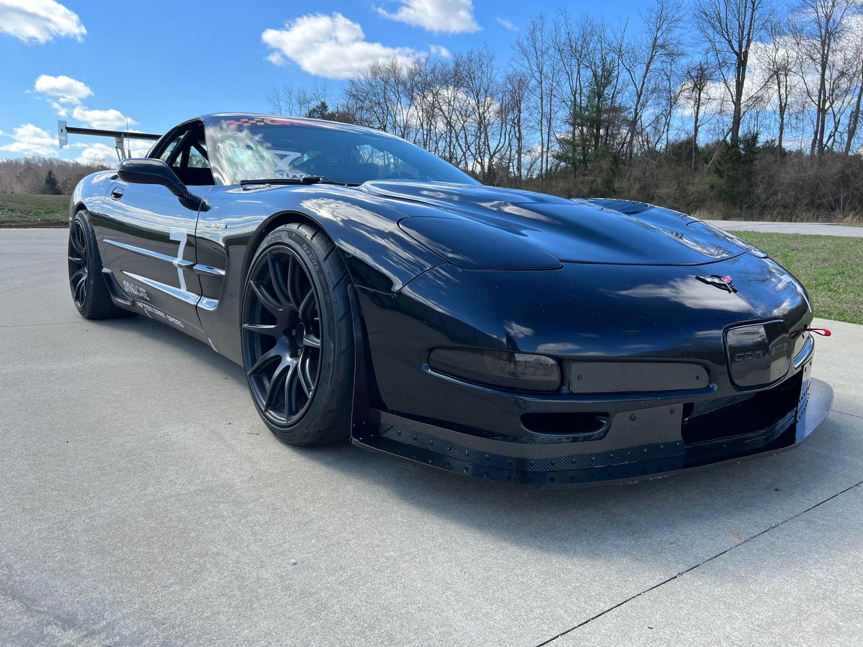Black Chevrolet C5 Corvette Z06 with 19" SM-10 Apex wheels in Satin Black
