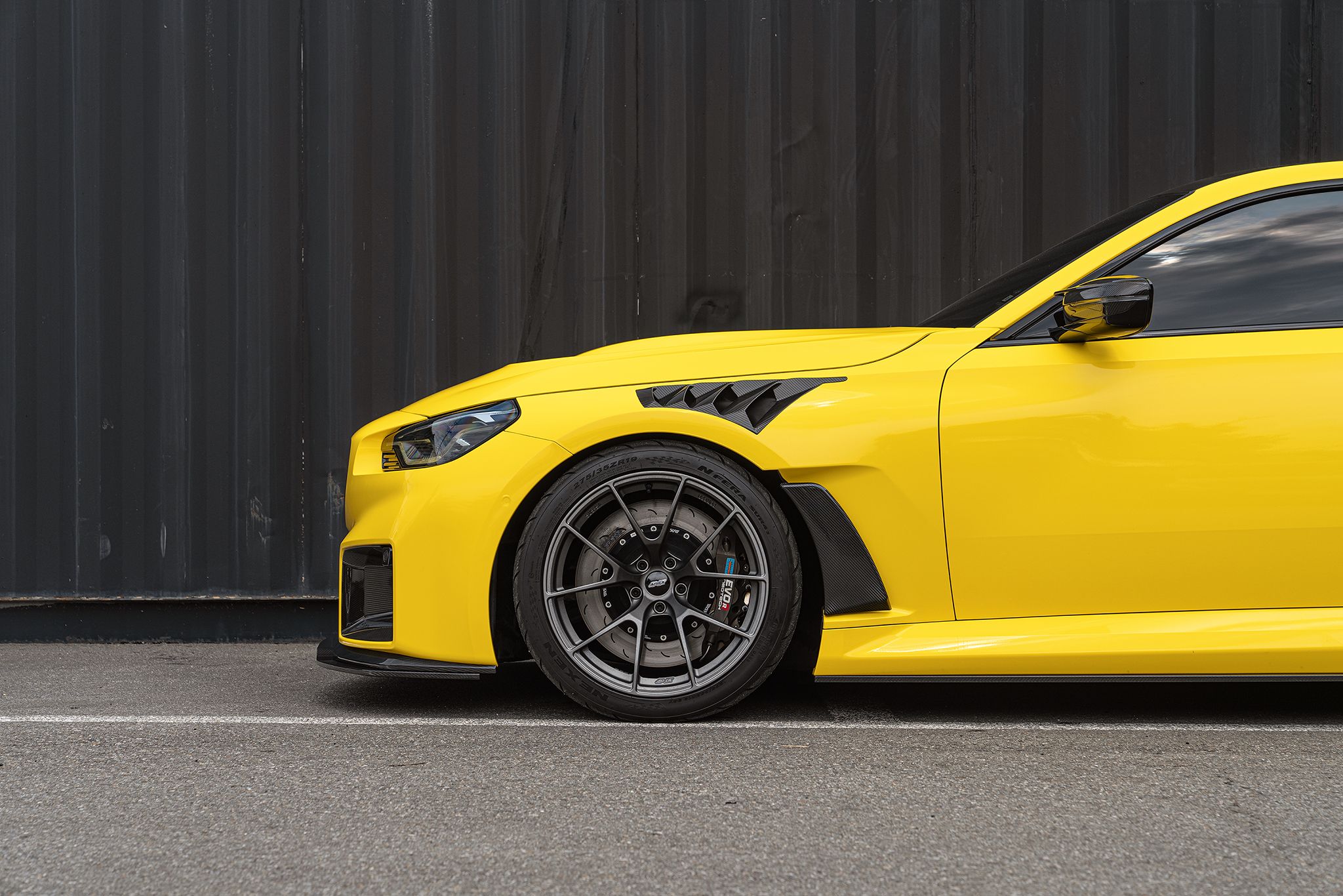 Yellow BMW G87 M2 with 19" VS-5RS Apex wheels in Anthracite
