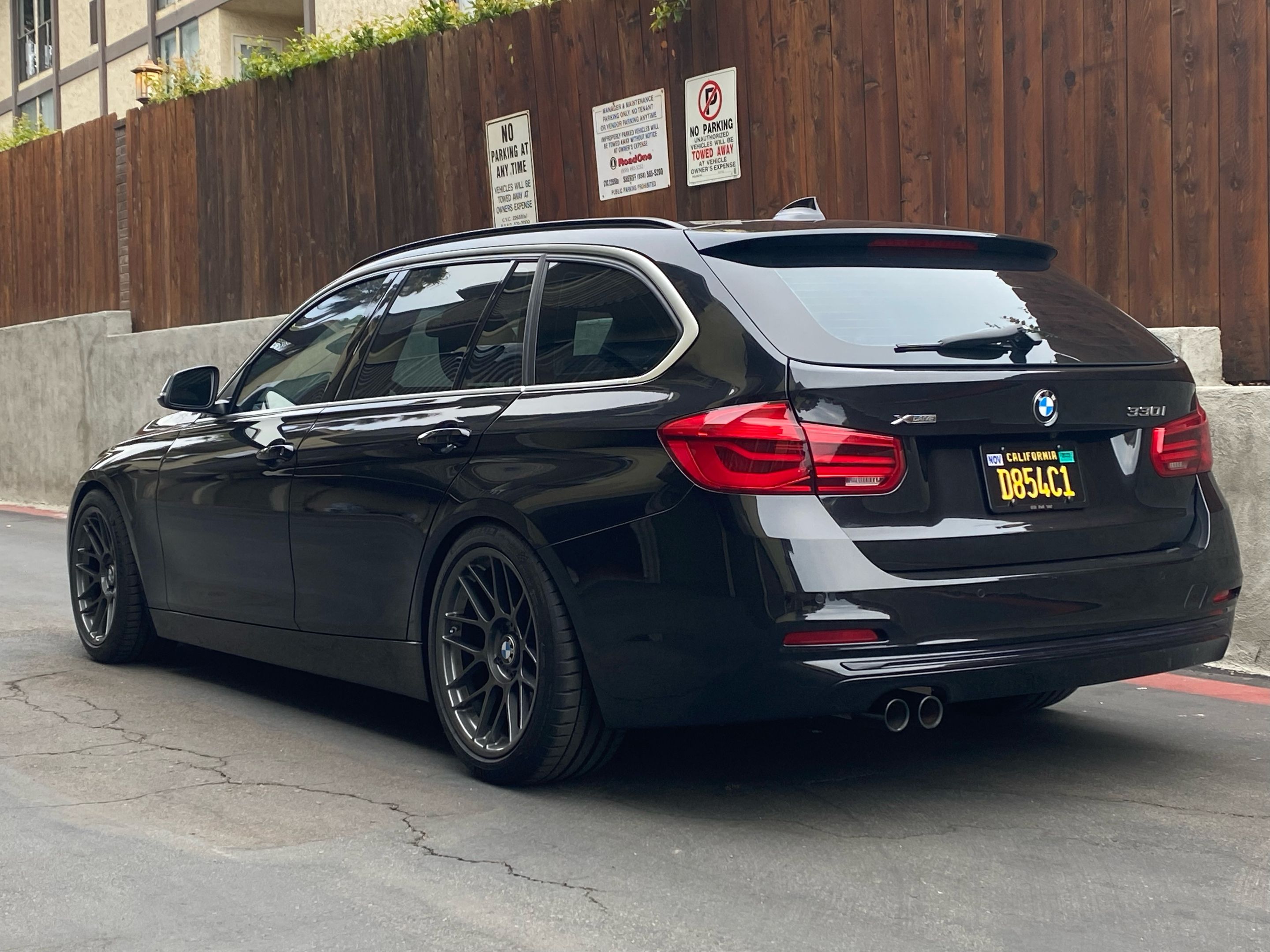 Black BMW F31 Wagon 3 Series with 18" ARC-8 Apex wheels in Anthracite
