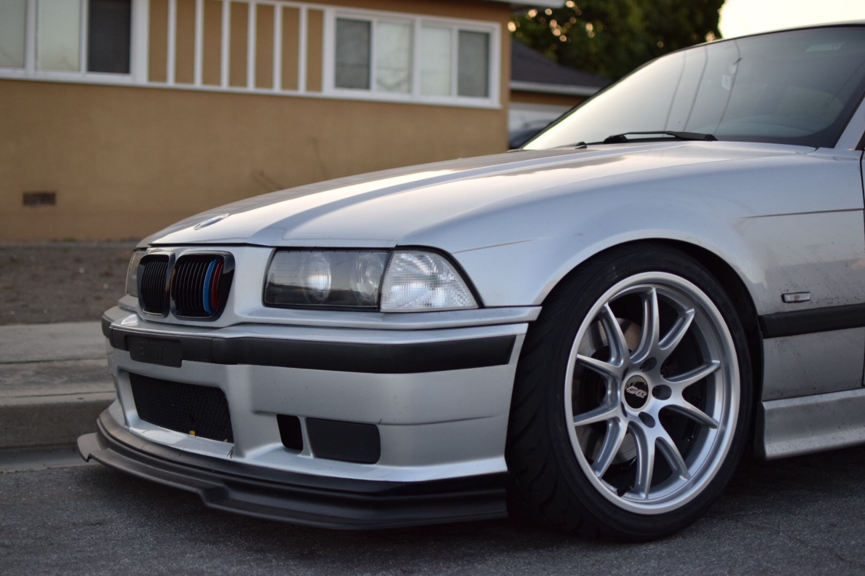 Silver BMW E36 M3 with 18" FL-5 Apex wheels in Race Silver