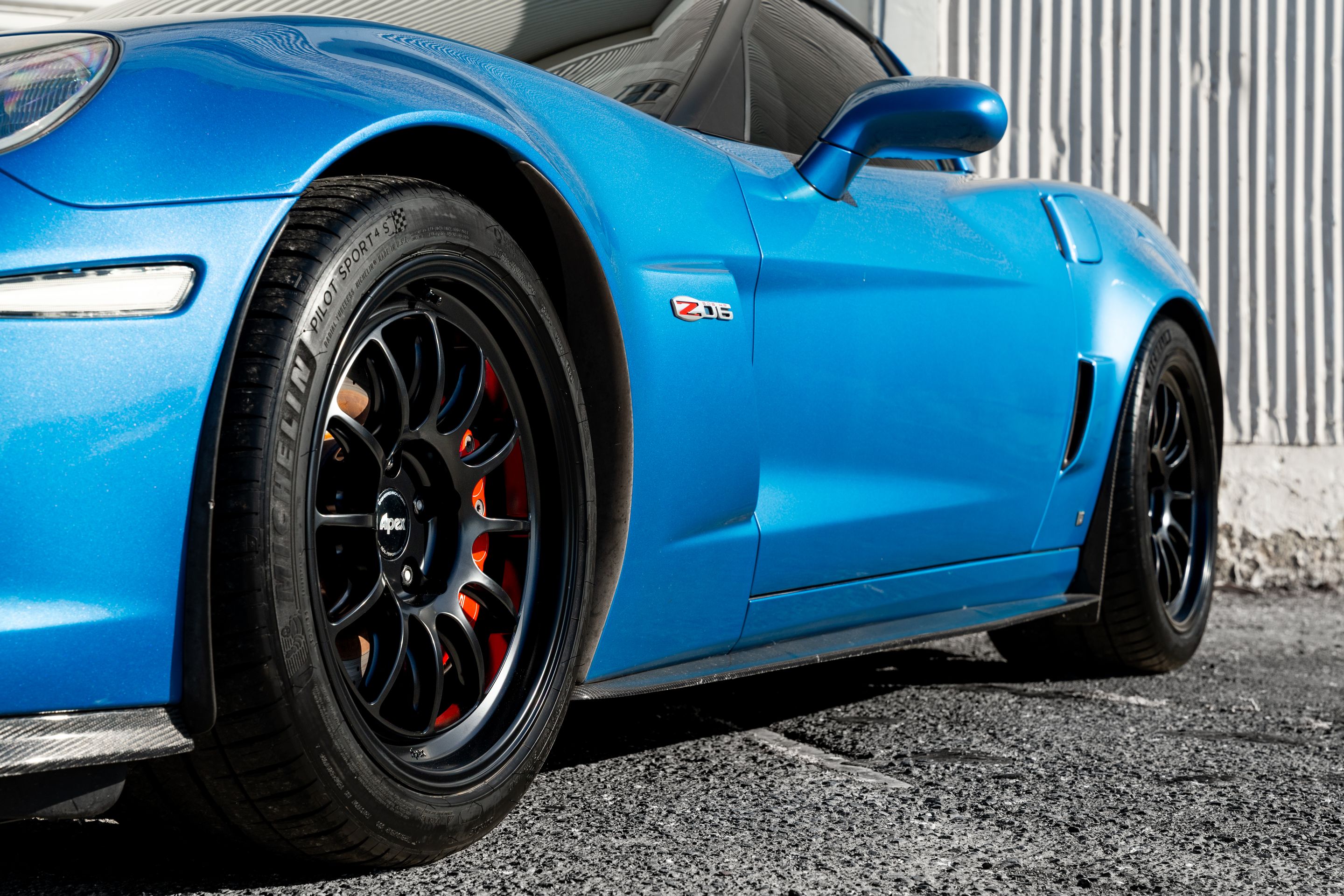 Blue Chevrolet C6 Corvette Z06 with 18"/19" TEST-S Apex wheels in Satin Black