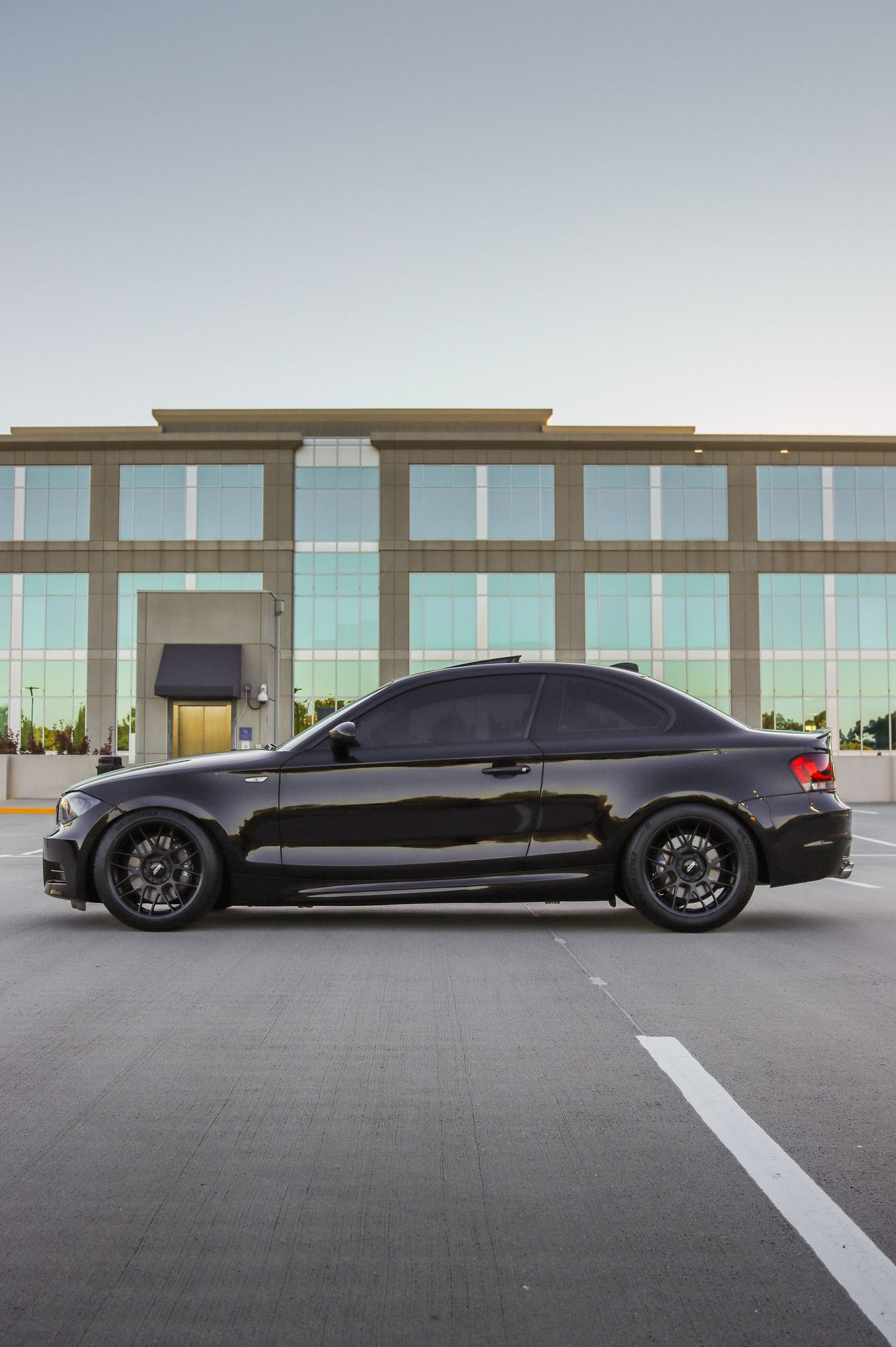 Black BMW E82 Coupe 1 Series with 18" ARC-8 Apex wheels in Satin Black