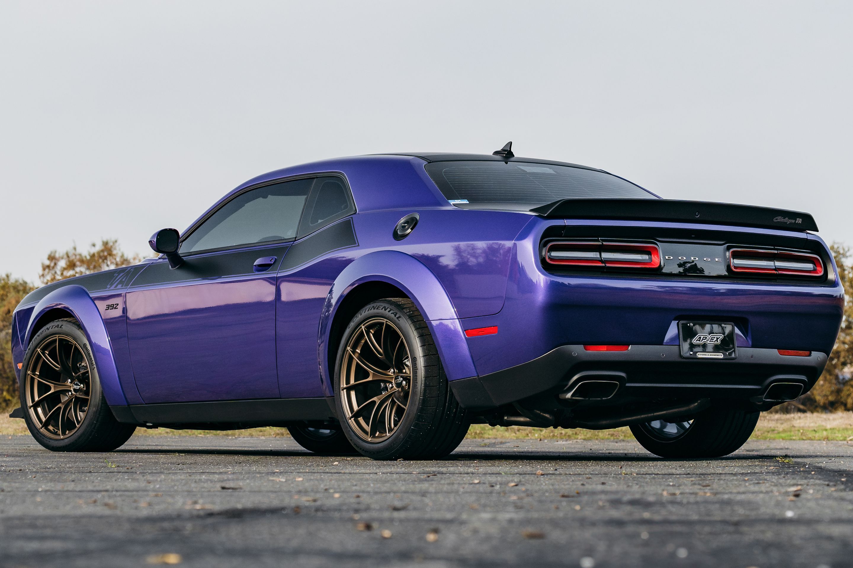Purple Dodge Challenger R/T Scat Pack Widebody with 20" VS-5RS Apex wheels in Satin Bronze