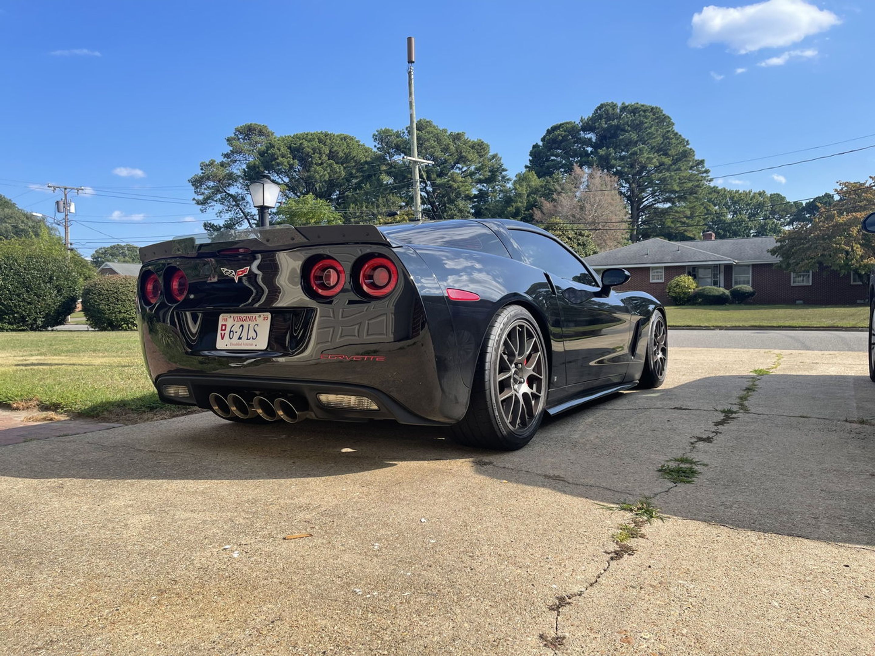 Black Chevrolet C6 Corvette Base/Z51 with 18"/19" EC-7 Apex wheels in Anthracite