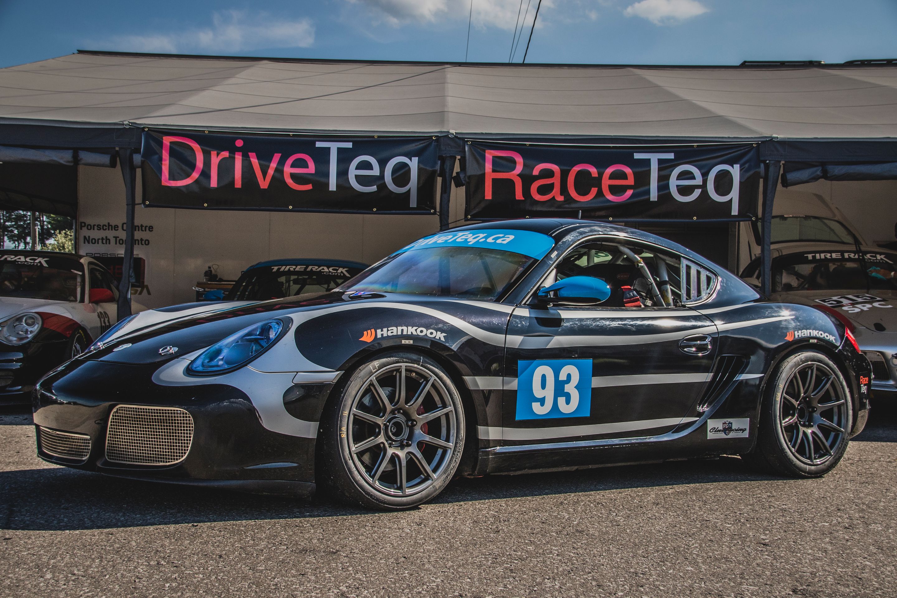 Black Porsche 987 Spec Cayman (SPC) with 18" SM-10 Apex wheels in Anthracite